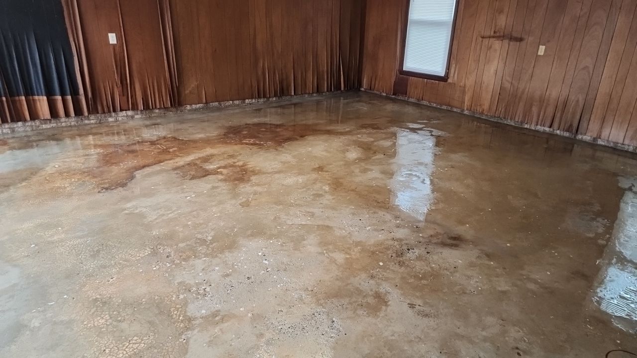 garage floor clean using cleaner by G&H Home Tech Pros LLC