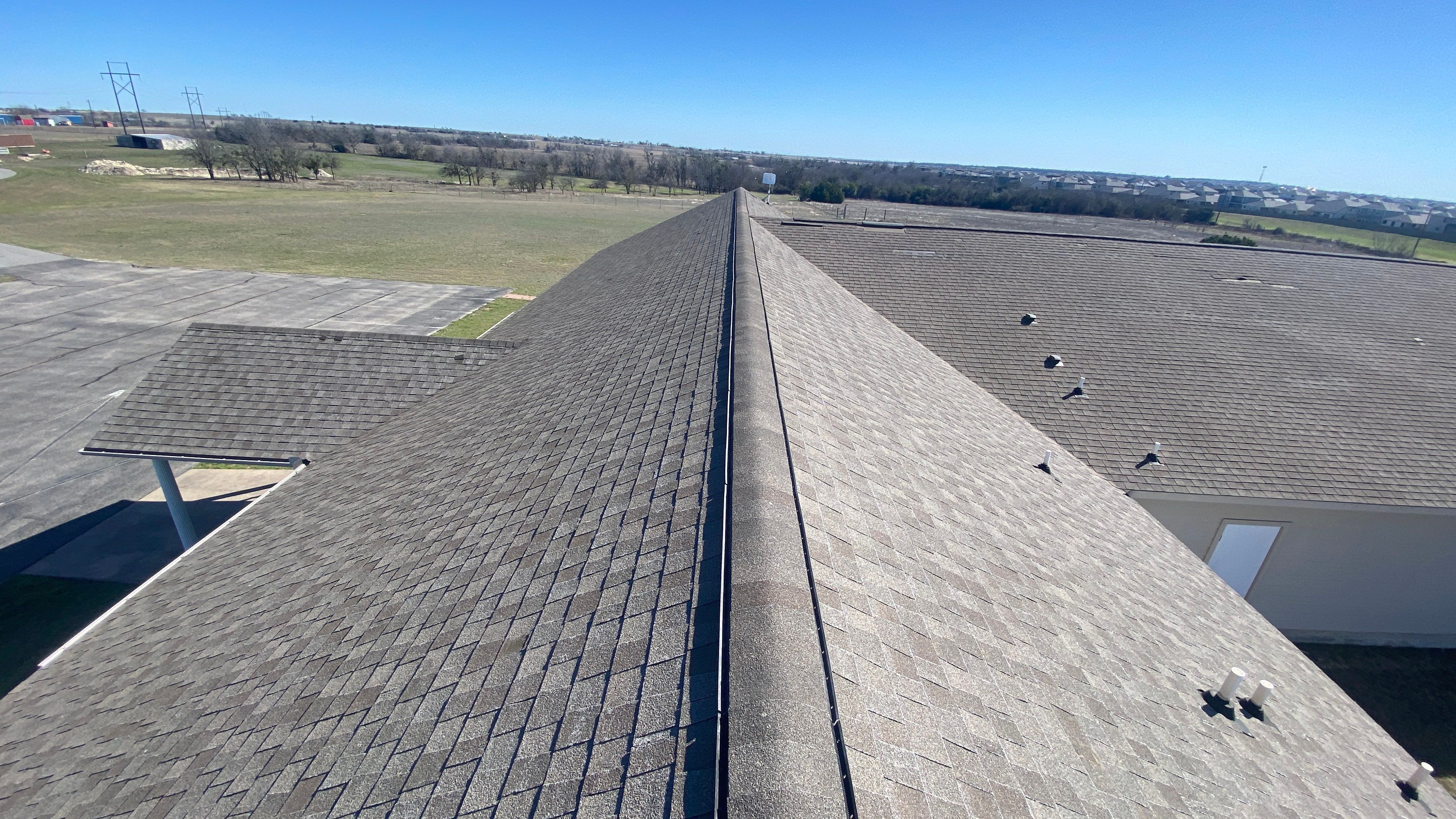 Commercial Roofing Installation using GAF - HDZ - Weathered Wood by Action Exteriors Austin