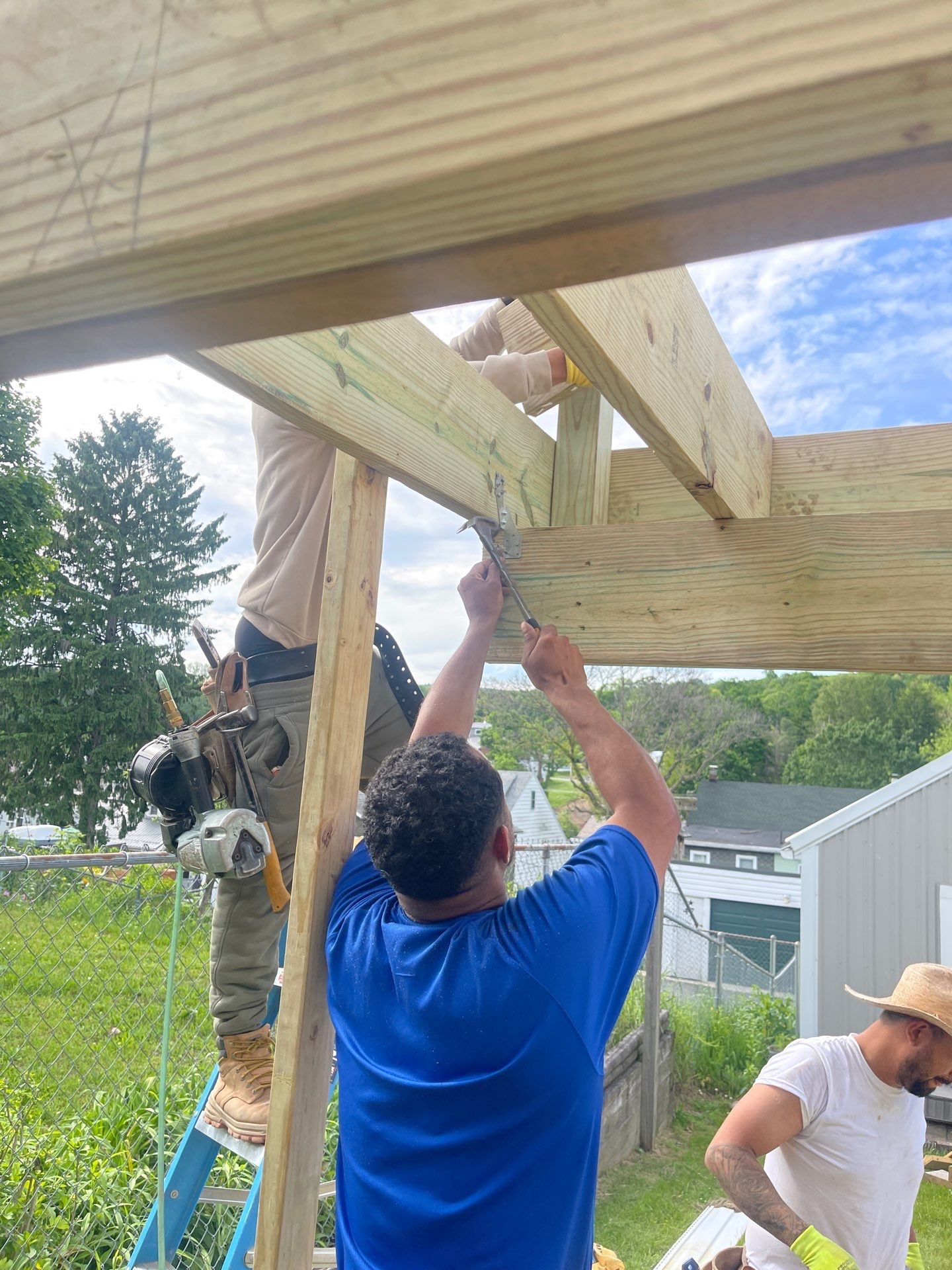 Pressure-Treated Wooden Staircase and Concrete Footing Installation in Schuylkill Haven by Herts Roofing & Construction