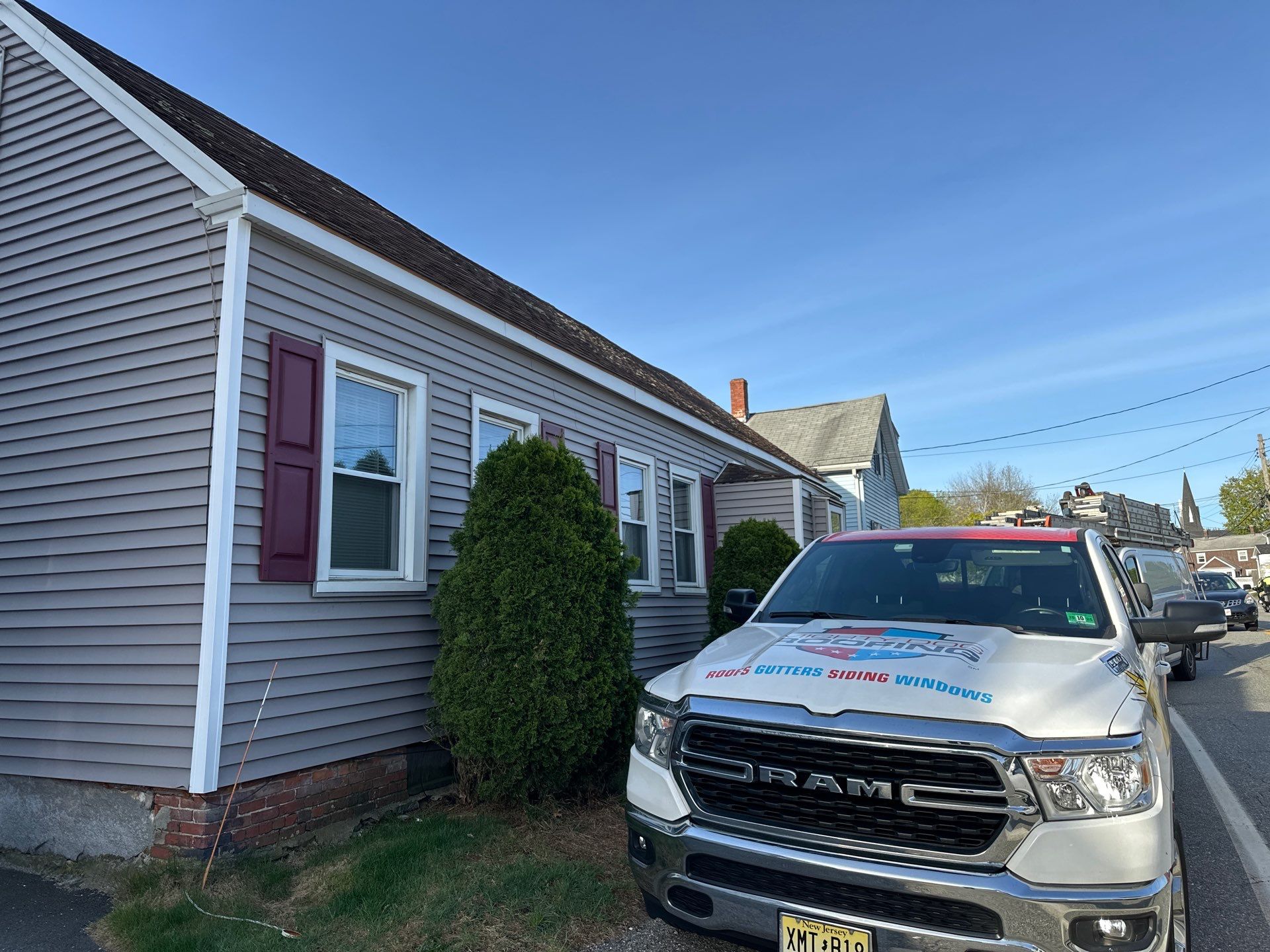 Roof Replacement with Owens Corning TruDefinition Shingles in Midnight Plum by Mighty Dog Roofing of Greater Middlesex County