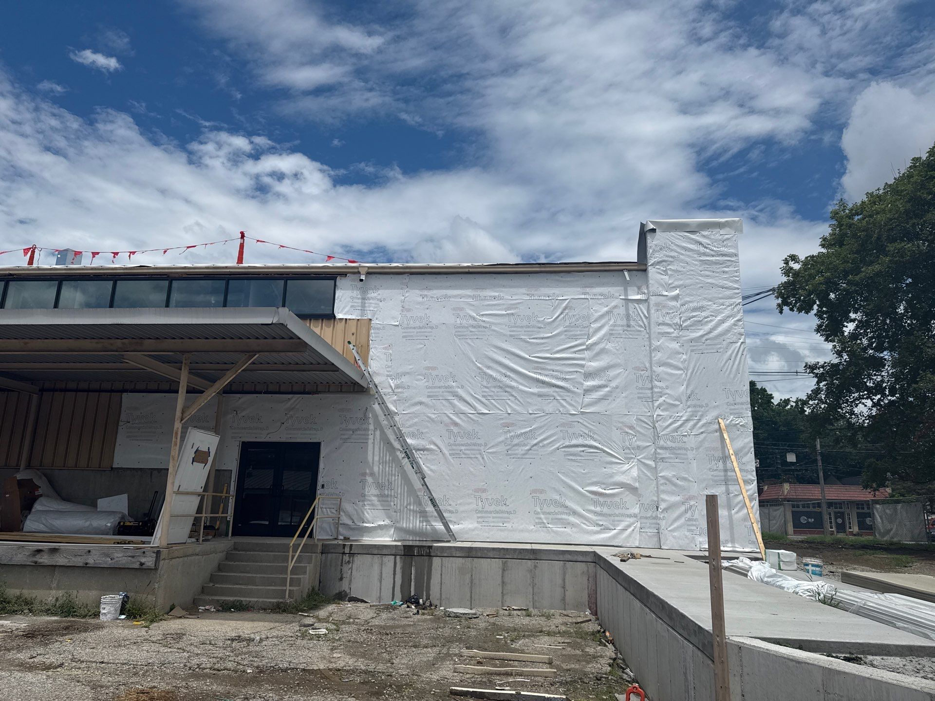 Louisville Commercial Building Siding and Window Installation by GreenForce Restoration