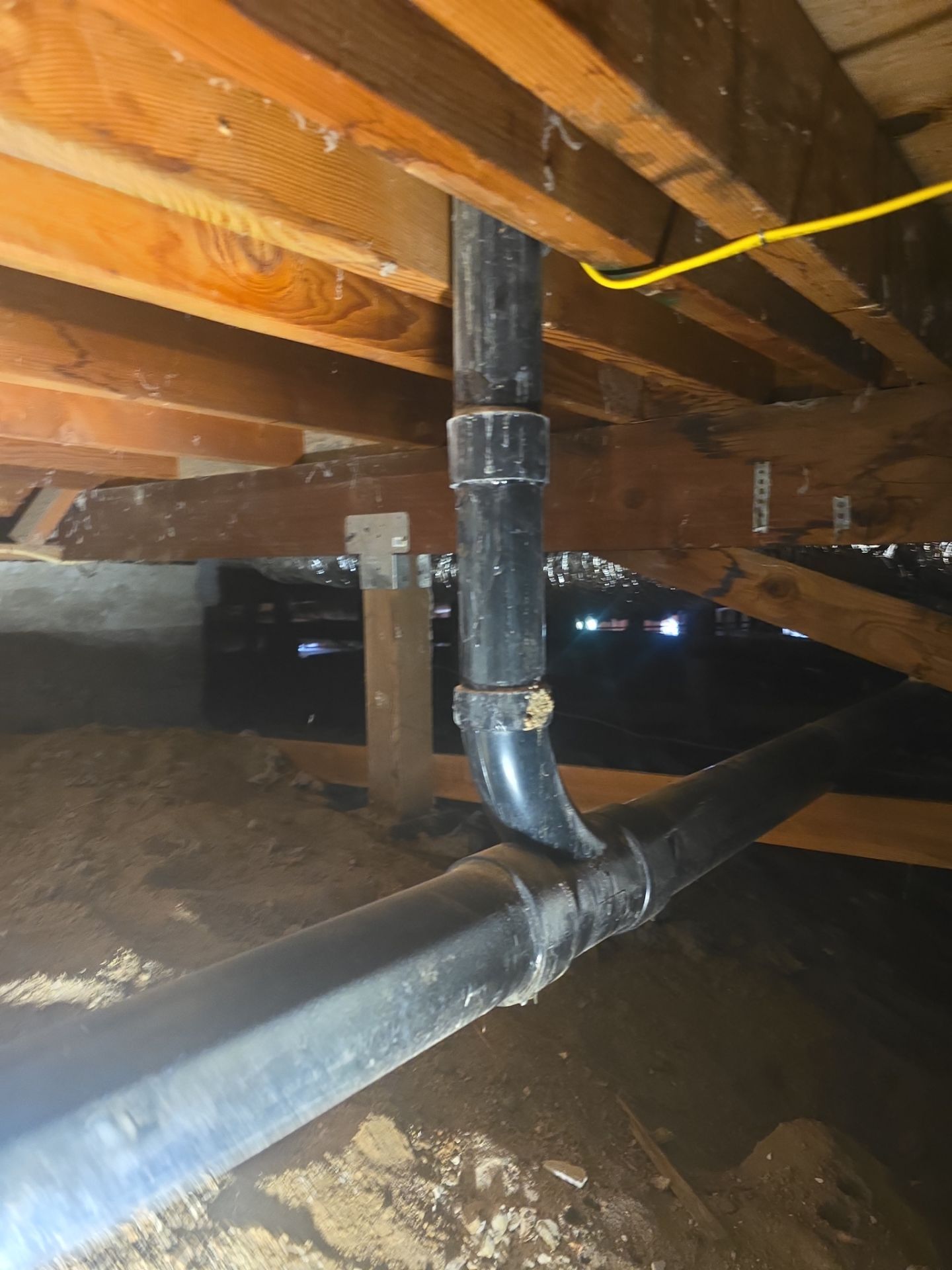 Installation of New Tall Black Piping (Wall to Ceiling) & Underground Piping by Us Plumbing