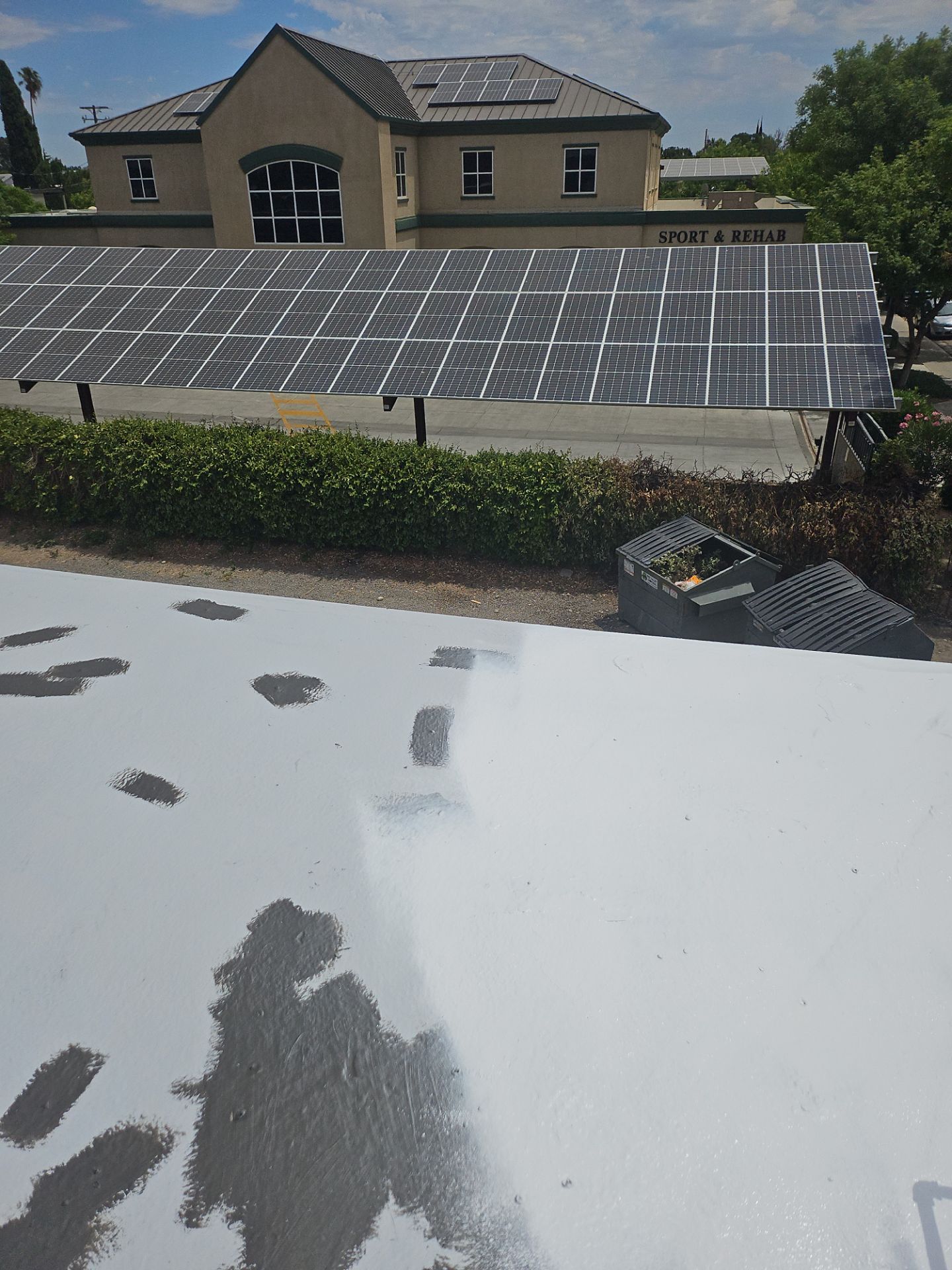 Foam Refurbish using General Coatings acrylic coatings and spray foam by Straight Edge Roofing Inc