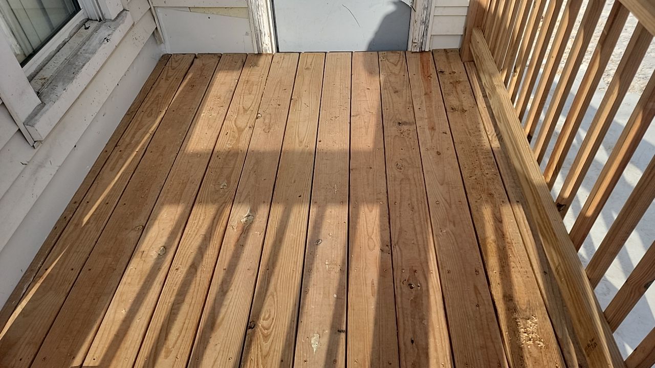Deck Installation using Treated Lumber by Avalon Roofing and Exteriors
