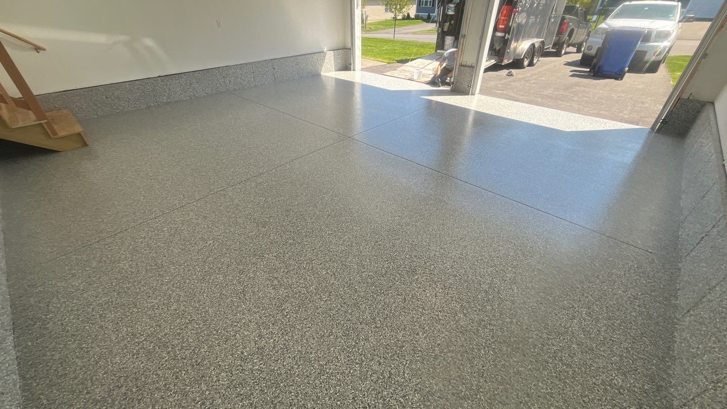 Garage in Londonderry, NH 03053 by Symphony Concrete Coatings