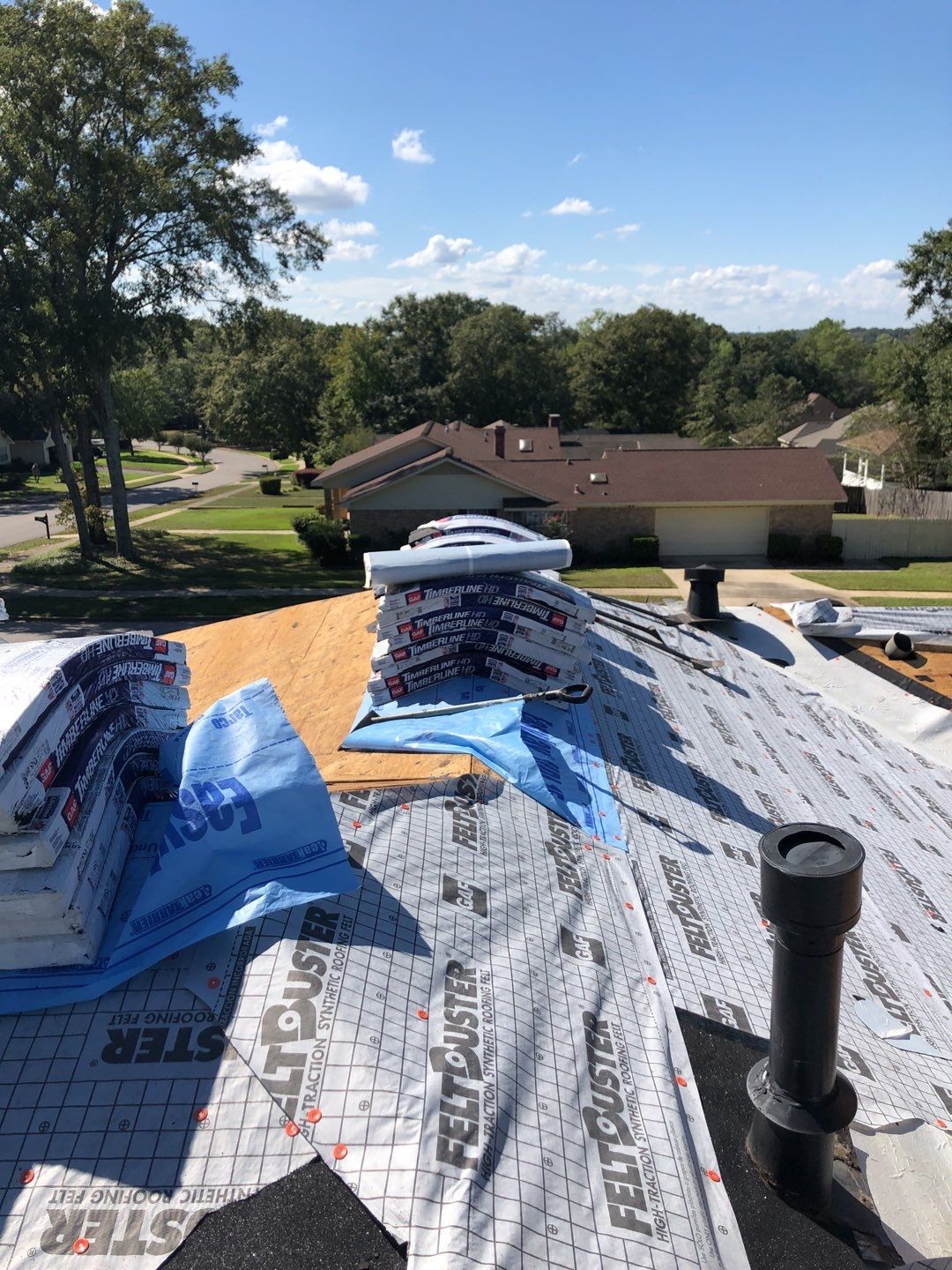 Residential Roofing Installation using Roof Replacement by American Roofing & Construction LLC
