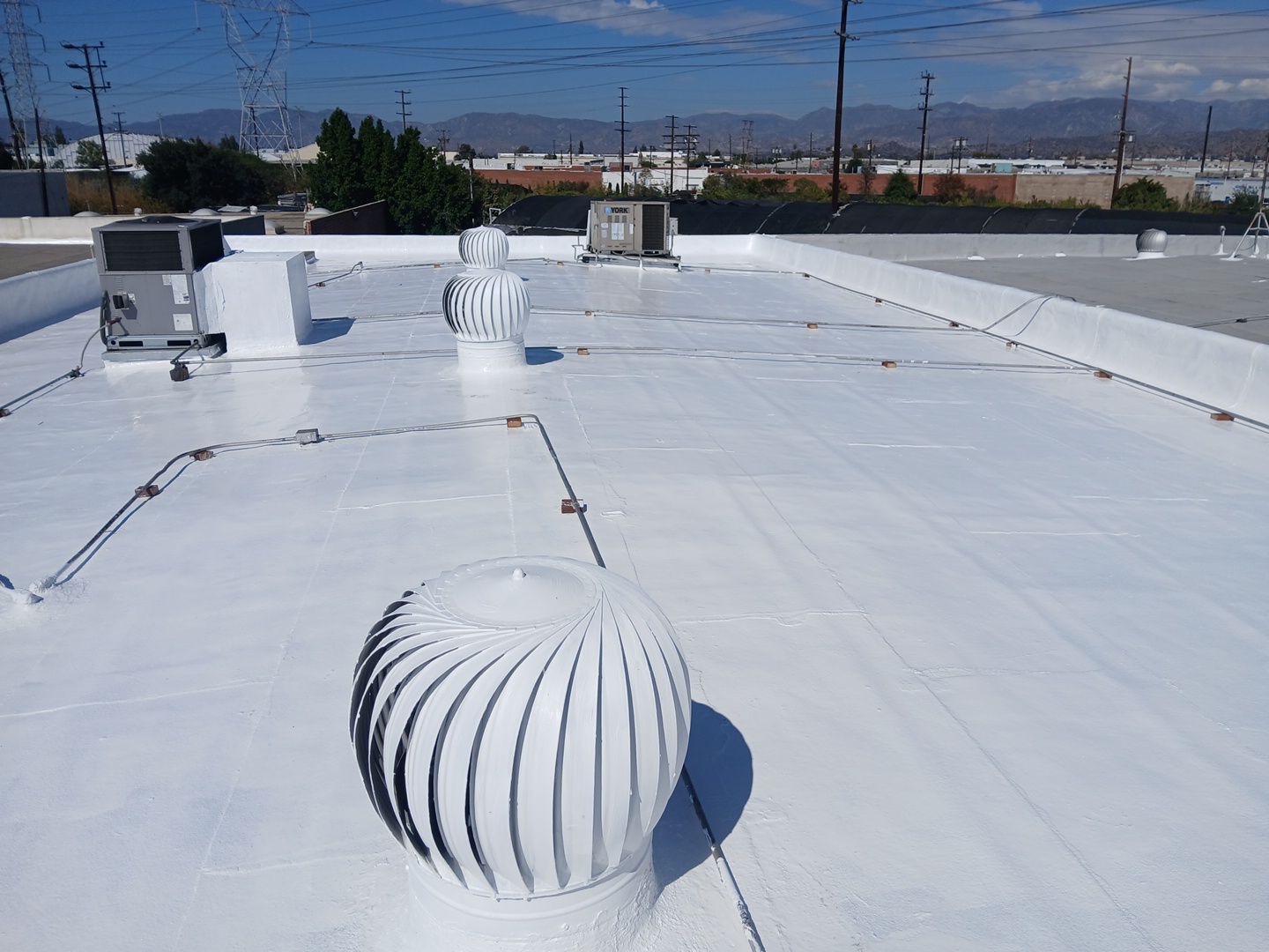 Commercial Silicone Membrane Installation Project by Hull Brothers Roofing