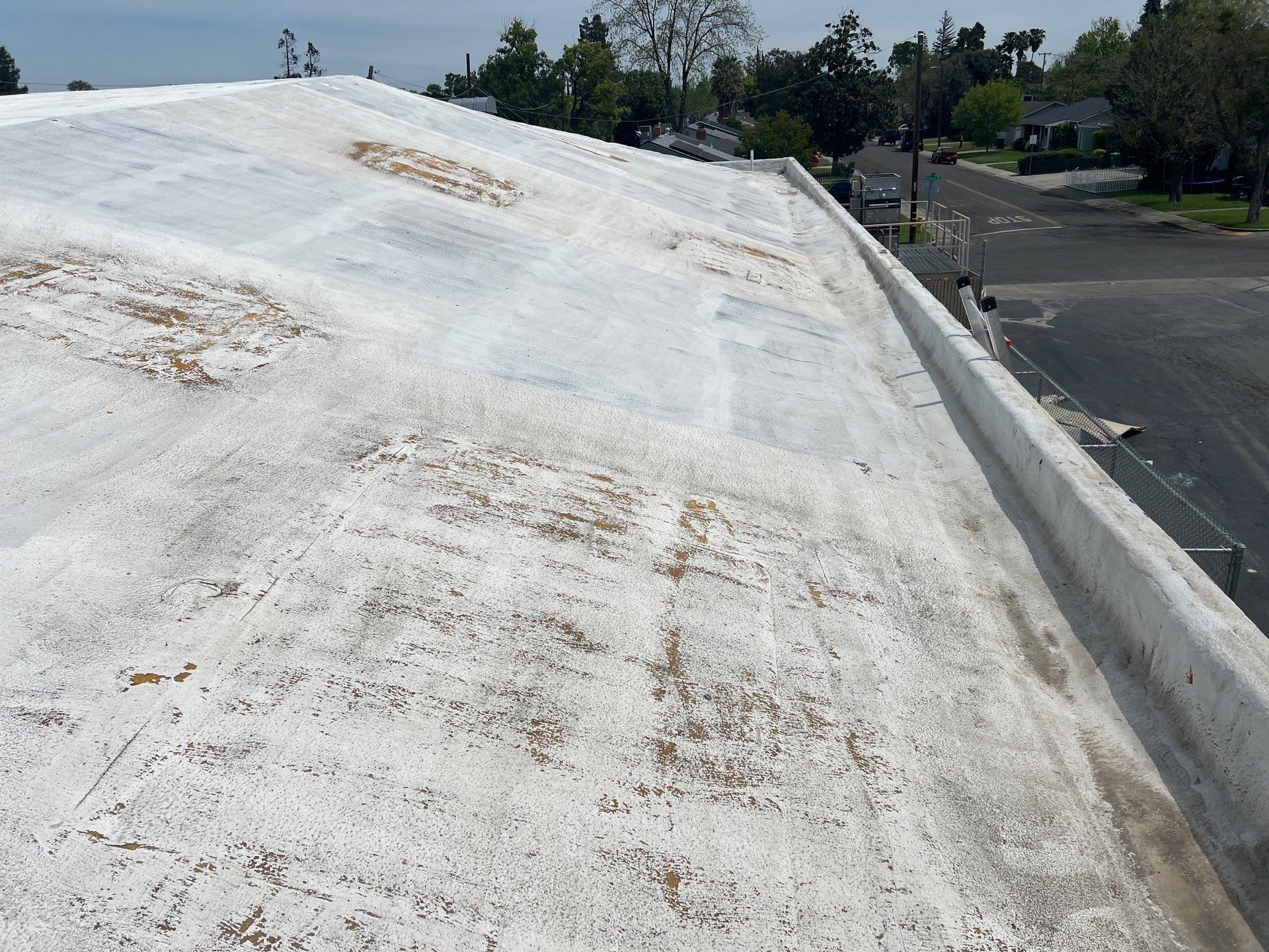 Foam Refurbish using Conklin Benchmark/PUMA XL coatings and spray foam by Straight Edge Roofing Inc