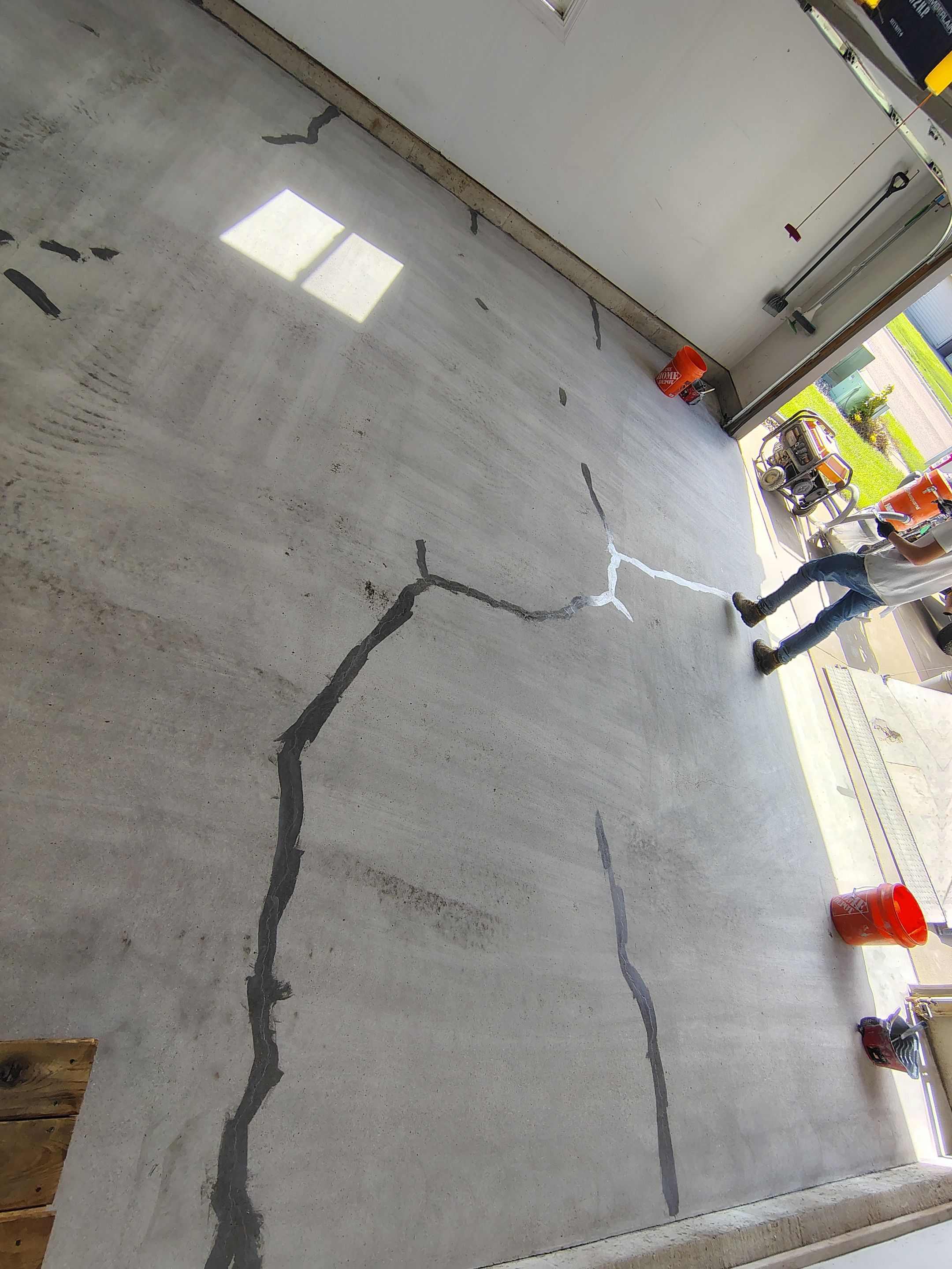 Decorative Chip Epoxy Garage Floor Coating in Sioux Falls by Select Painting, Coatings & Garage Cabinets