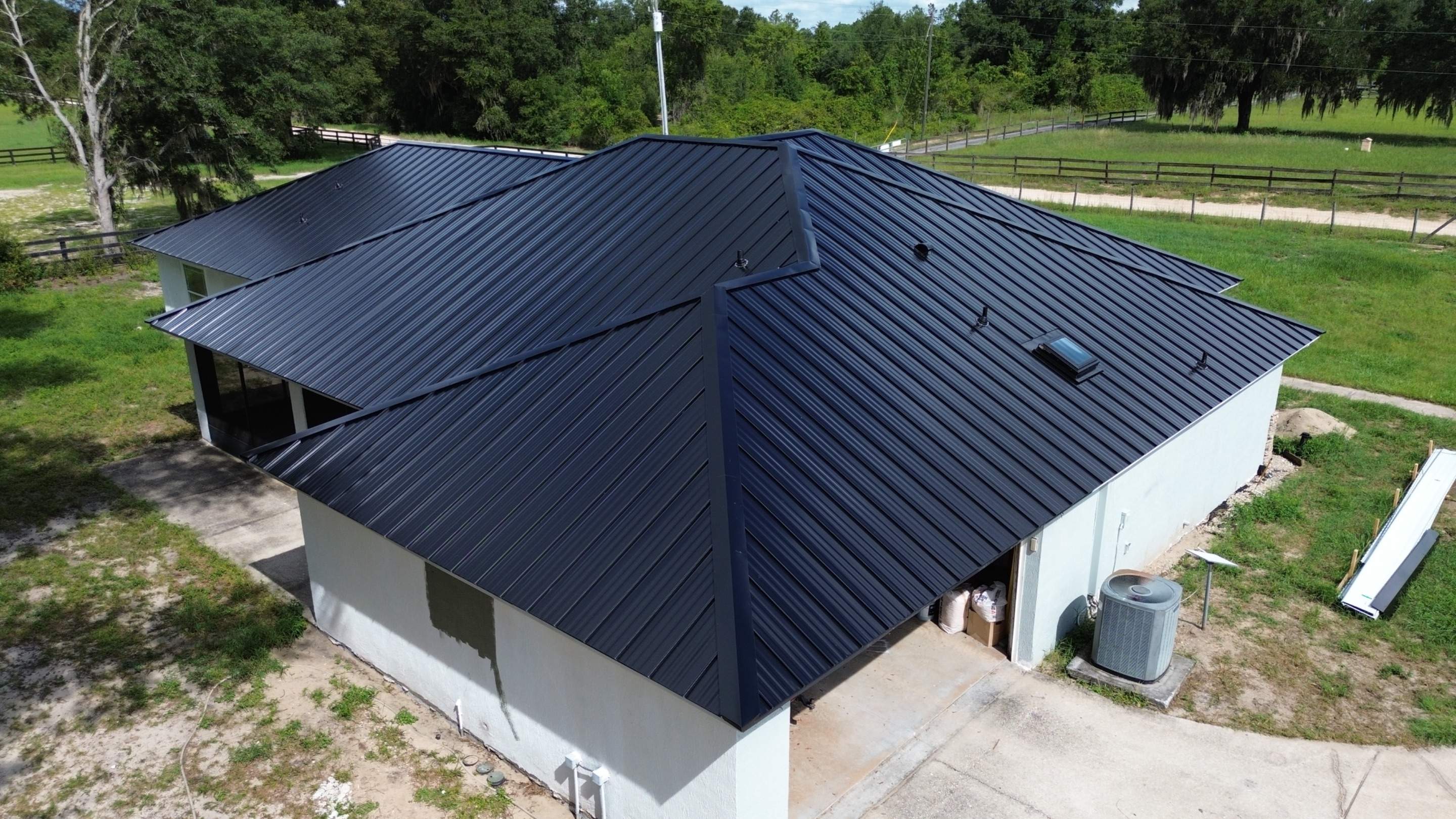 Residential Reroof | Architectural Shingles to 26 Gauge Standing Seam Metal | Groveland Fl by Gold Key Roofing