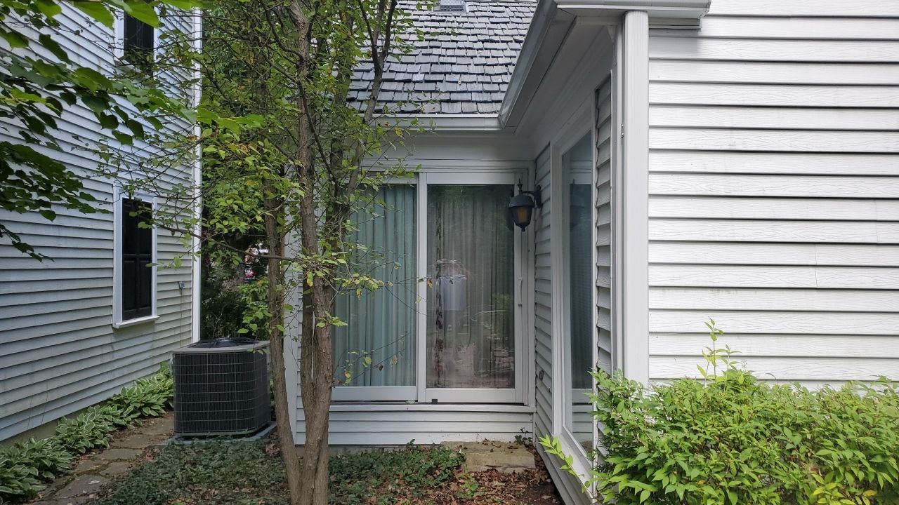 Housewashing  using Algaecide, soft wash soap by Northern Power Washing LLC.