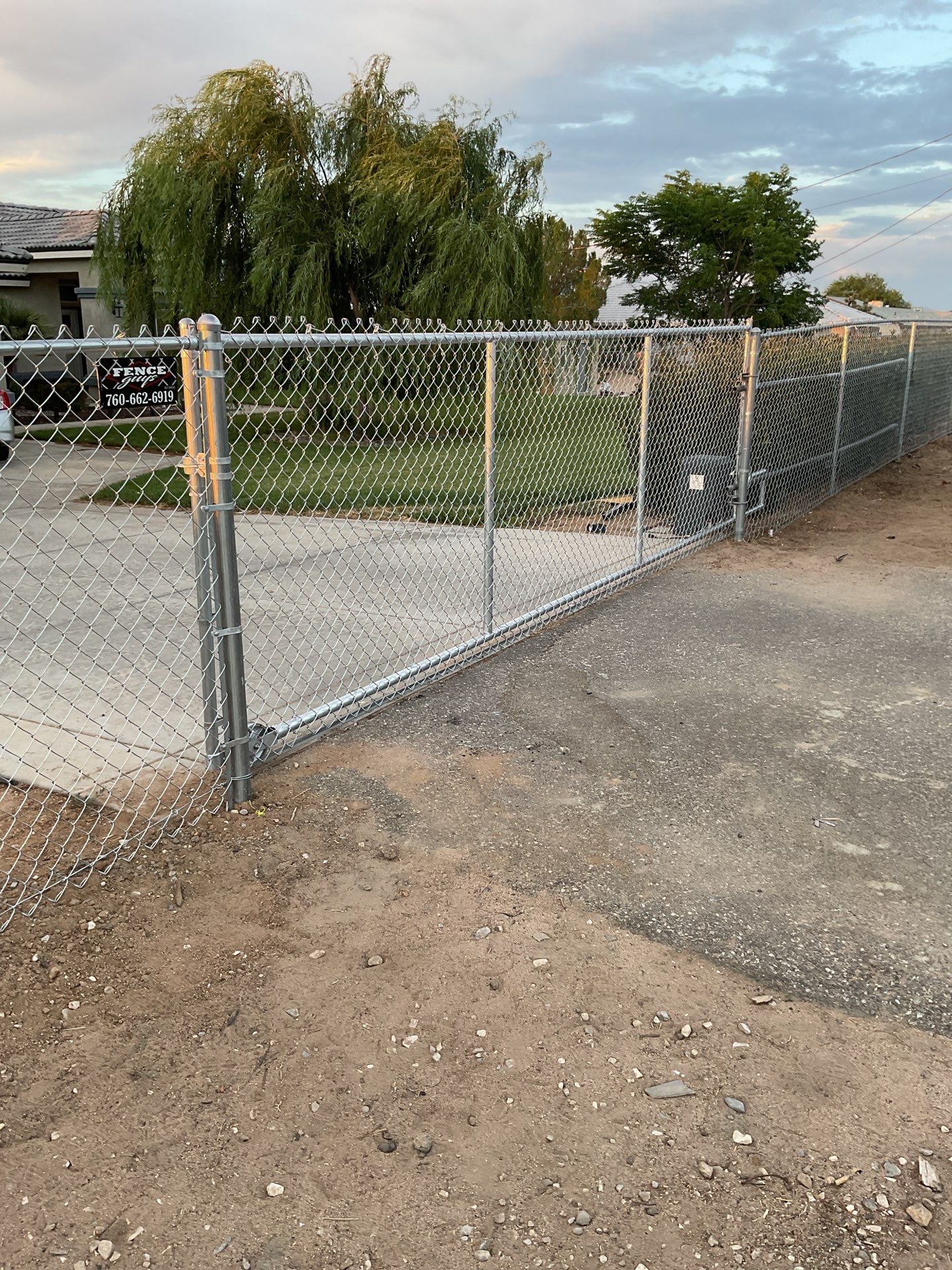 Fence Installation using chain -link by Fence Guys Inc.