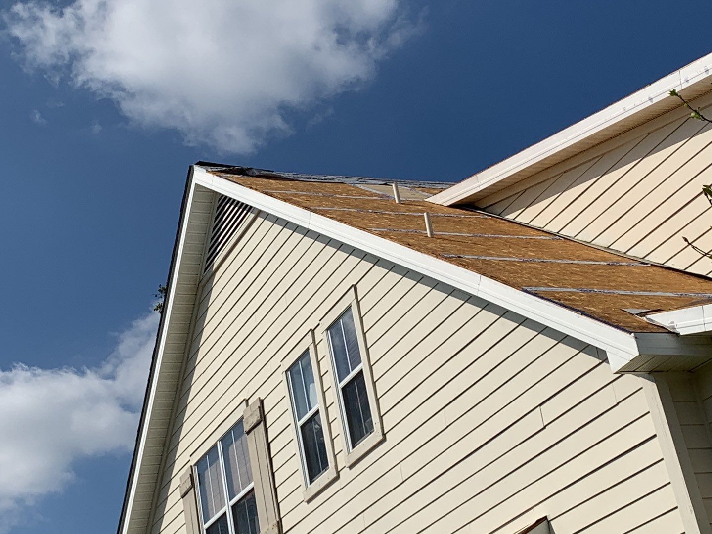 Residential Roofing Installation using Roof Replacement by American Roofing & Construction LLC