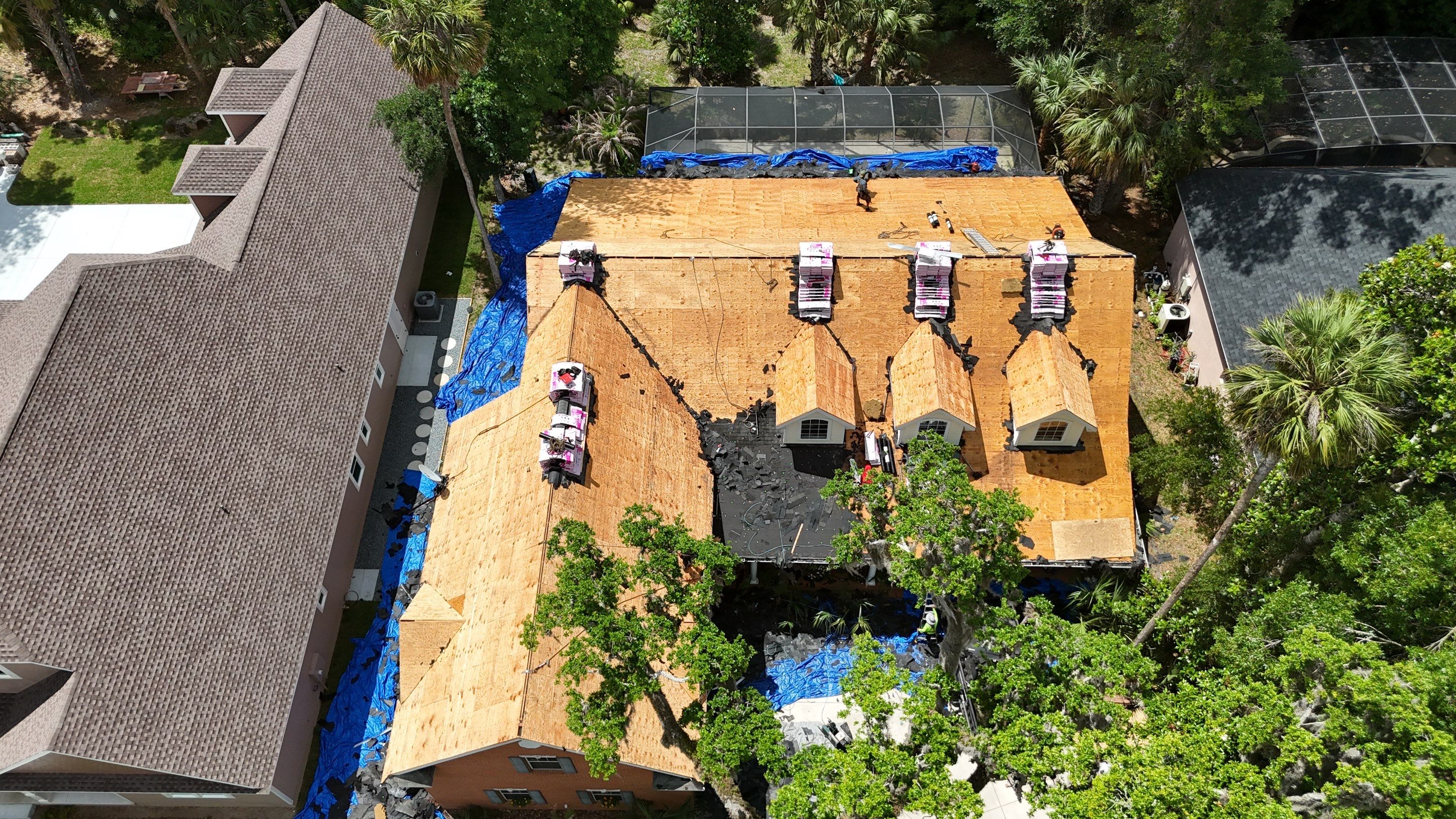 Comprehensive Onyx Black Asphalt Shingle Roof Replacement for Flagler Beach Residence by Trinity Restoration and Roofing LLC