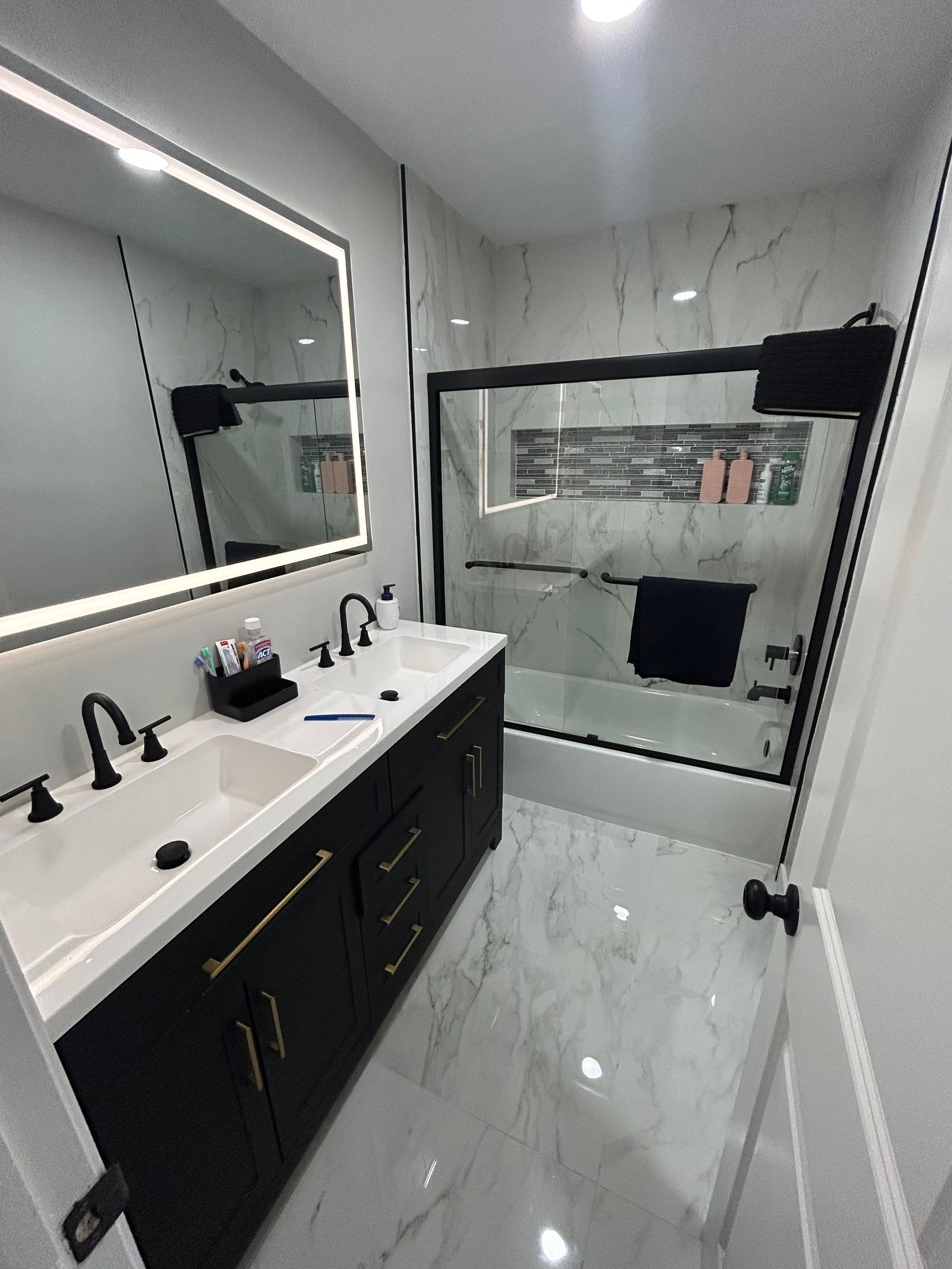 Master Bathroom, Children's Bathroom, and Fireplace Renovation by urban green energy llc