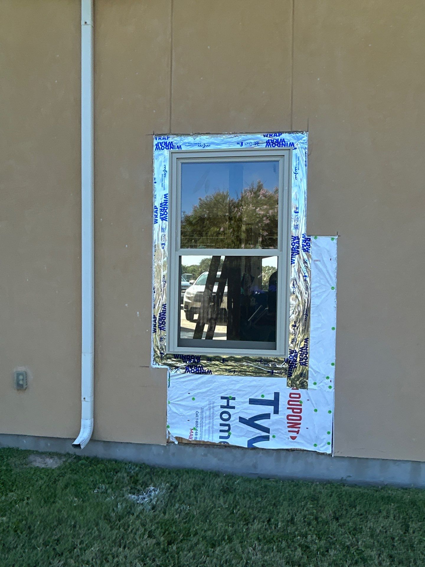 Installing Windows on a Submarine  by Bayfront Roofing and Construction