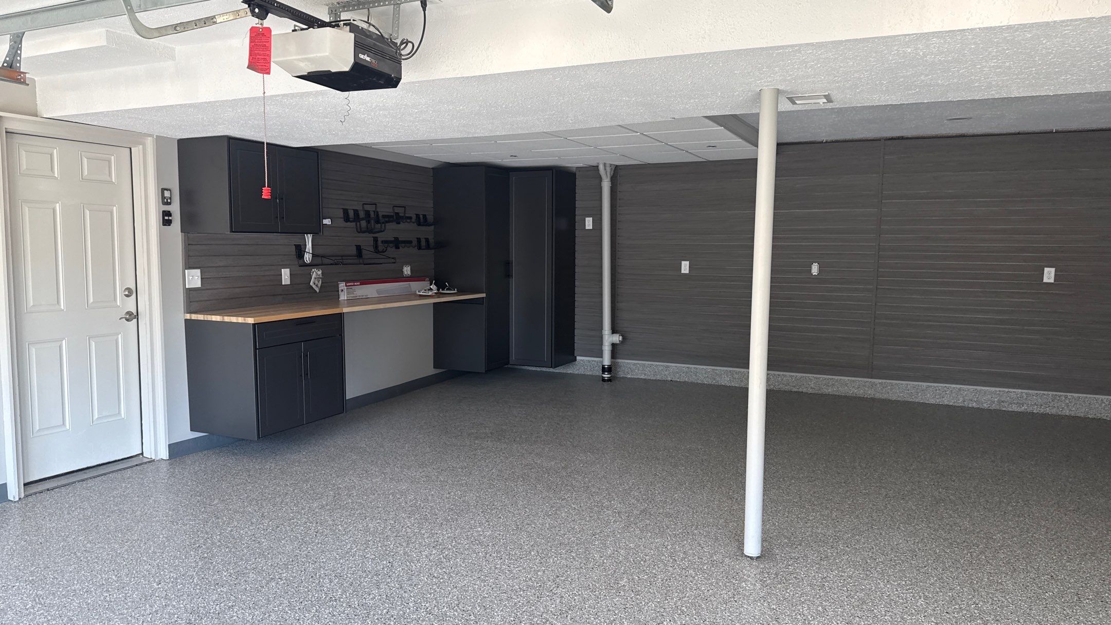 Wow Look Floor to Ceiling Slatwall  by Banner Garage