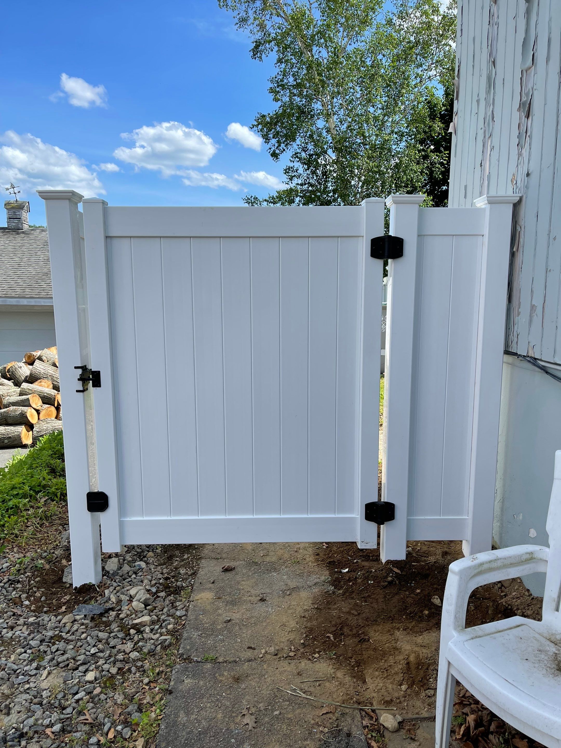 Replacement Vinyl Privacy fence with 3 matching gates in White.  by DiGiorgi Roofing and Siding Inc