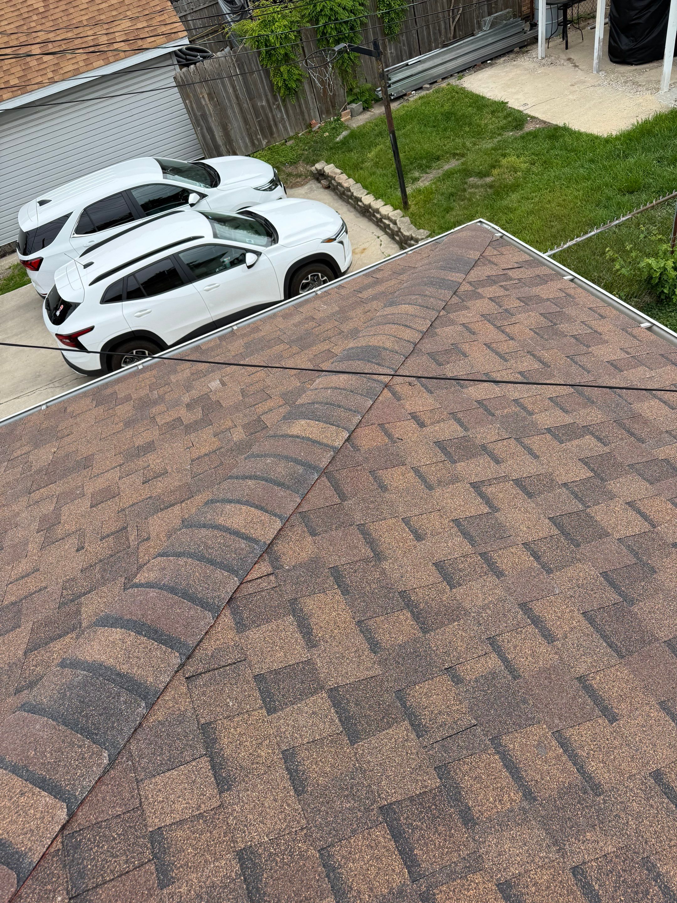 Roof replacement by wind damage by Just Brilliant Restoration JBR