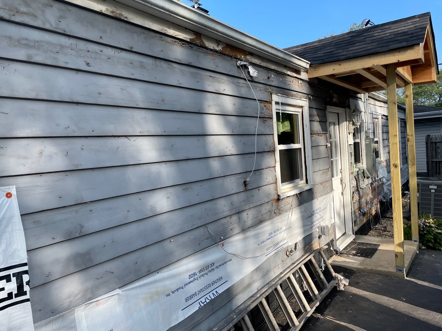 Siding Installation using Alside Charter Oak Siding  by Pro Home Services Inc