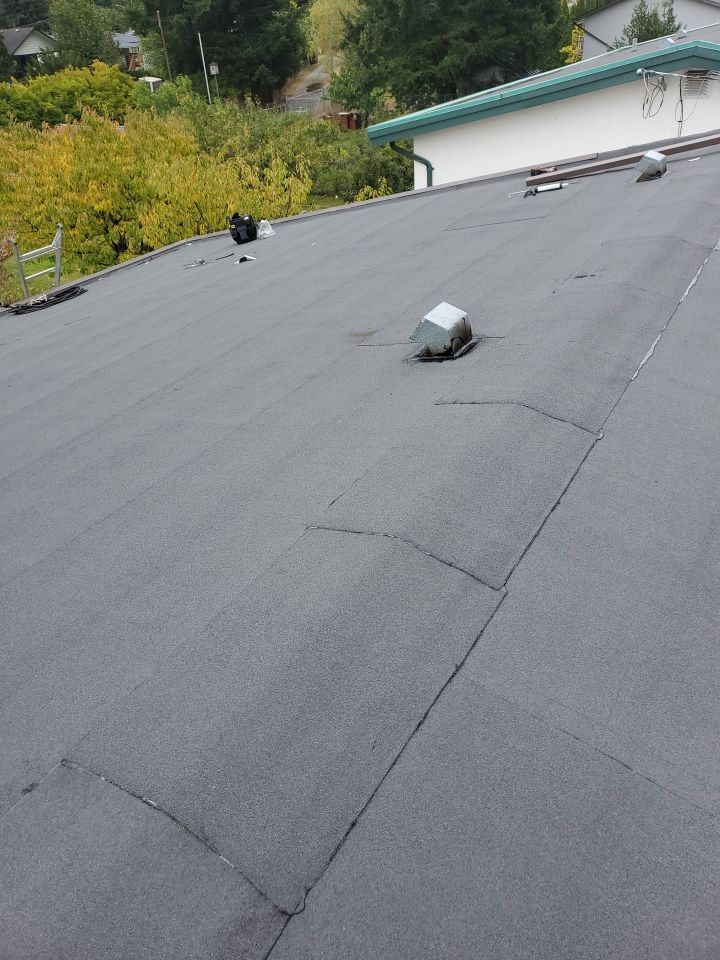 Residential ReRoofing Installation using IKO 2ply sbs  by Top Notch Roofing Inc