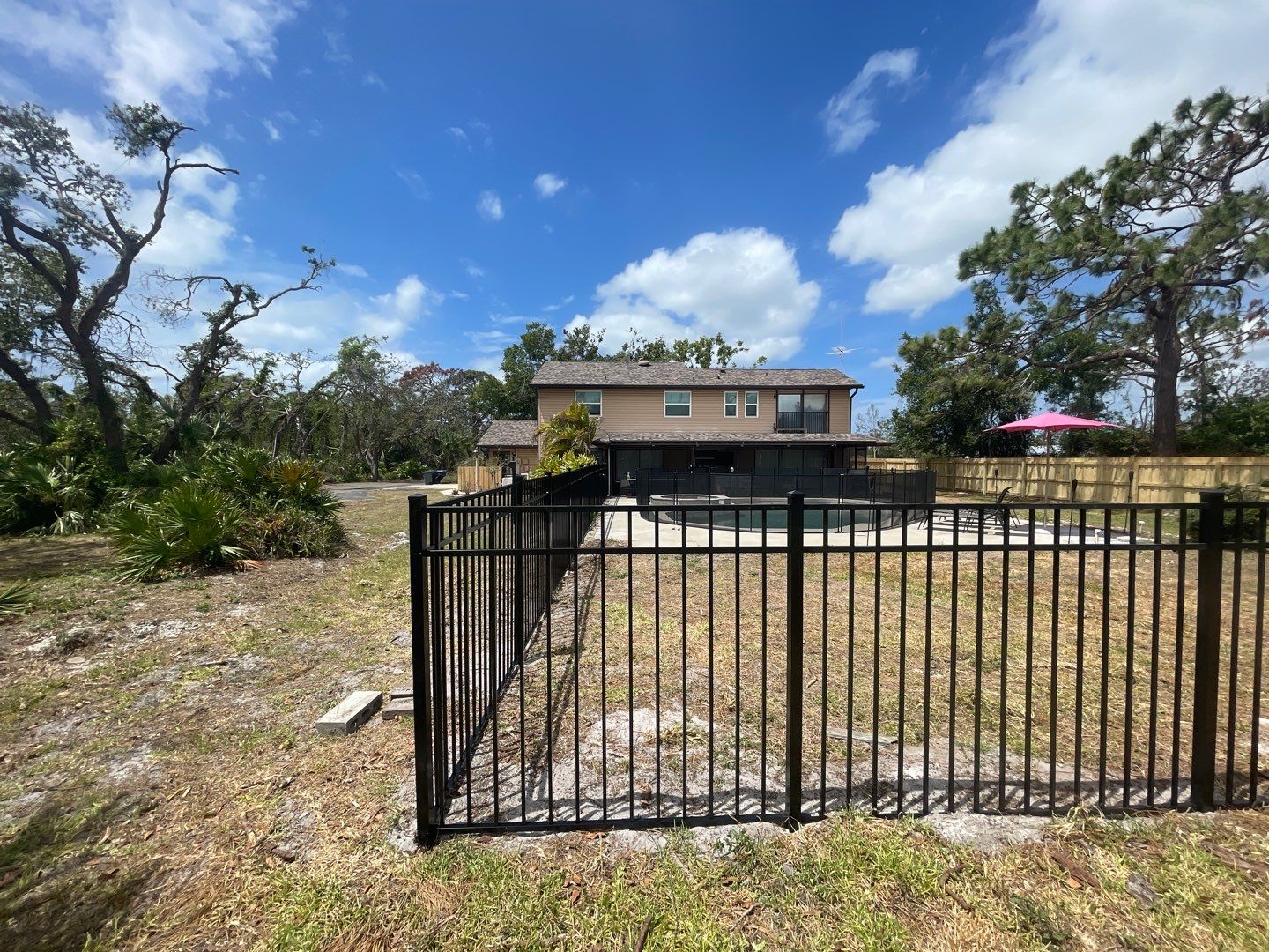 Black Aluminum 3 Rail Fence and Treated Wood Board on Board Privacy Fence  by Asap fence and gates, LLC