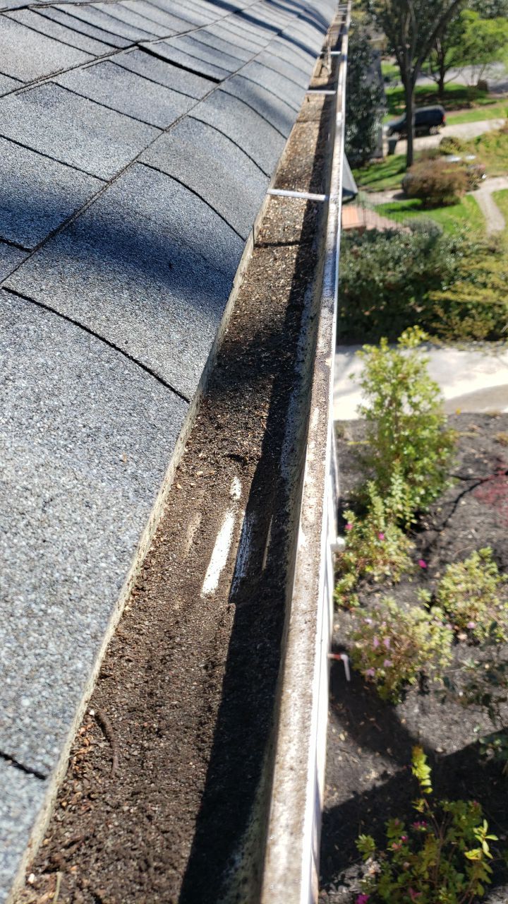 Gutter Cleaning using water by Power Wash Masters LLC