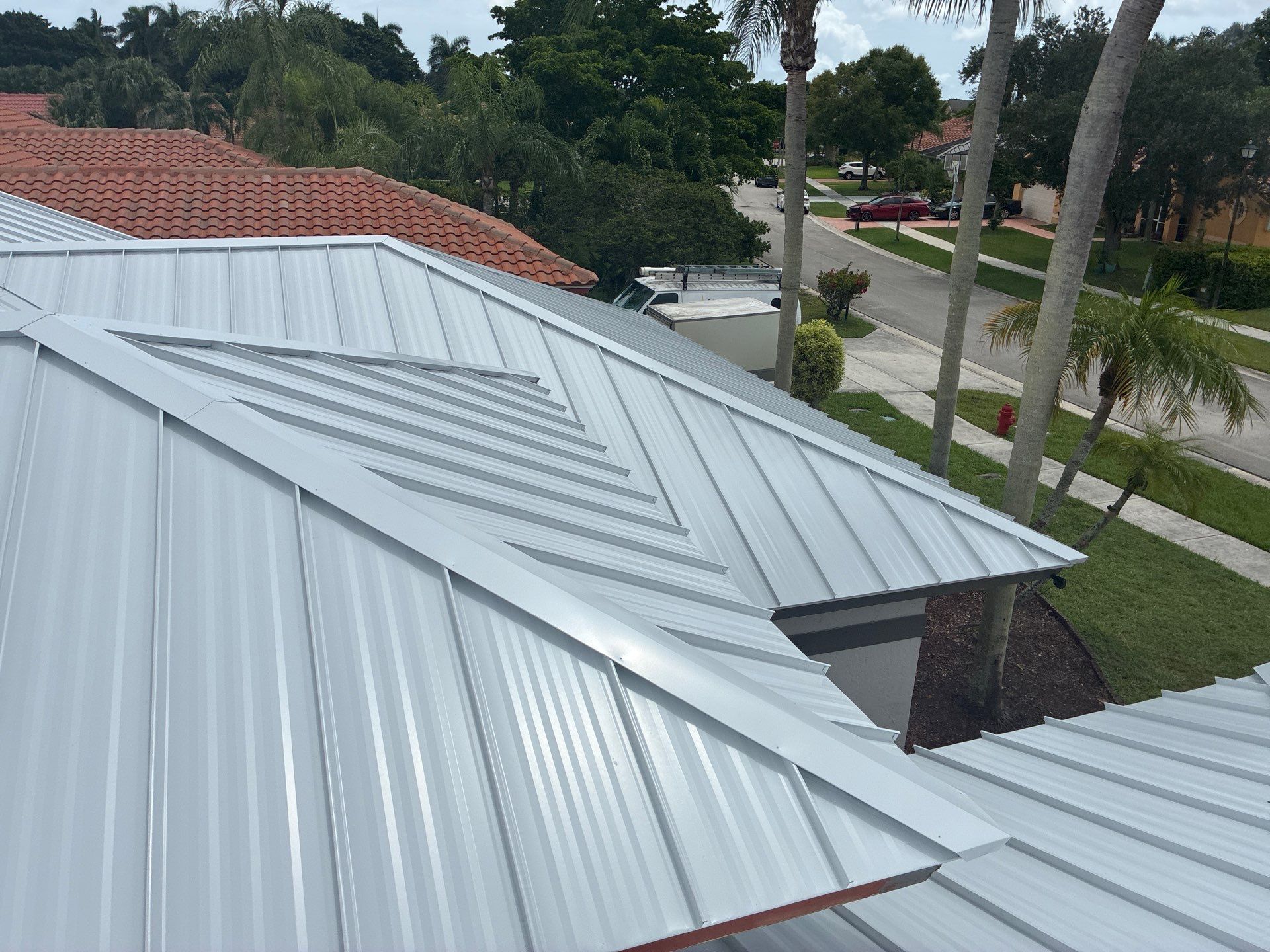 24ga 1.5" Mechanical Seam Regal White  by Total Roofing System The Metal Roof Experts