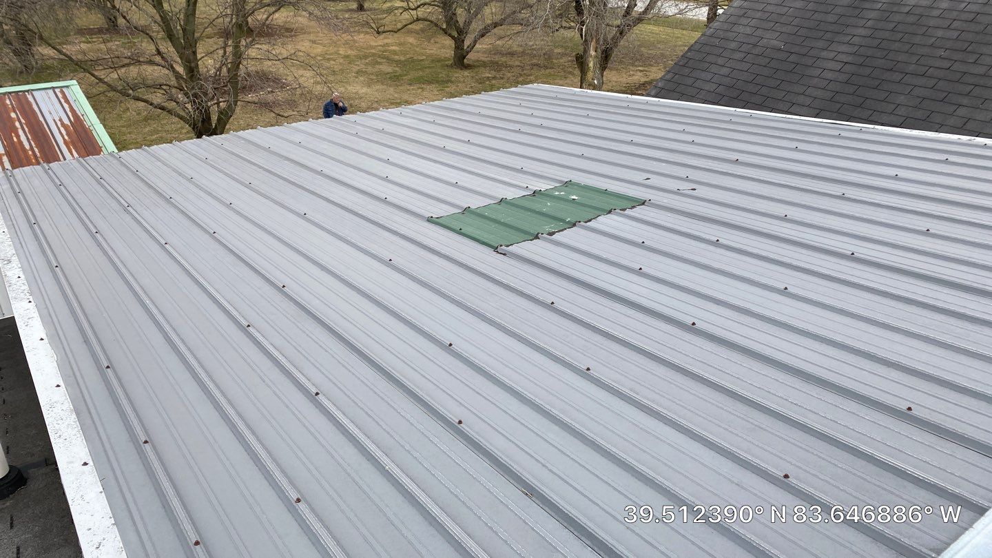 Residential Roofing Installation using Performance Panel Metal - Burnished Slate by RoofX 