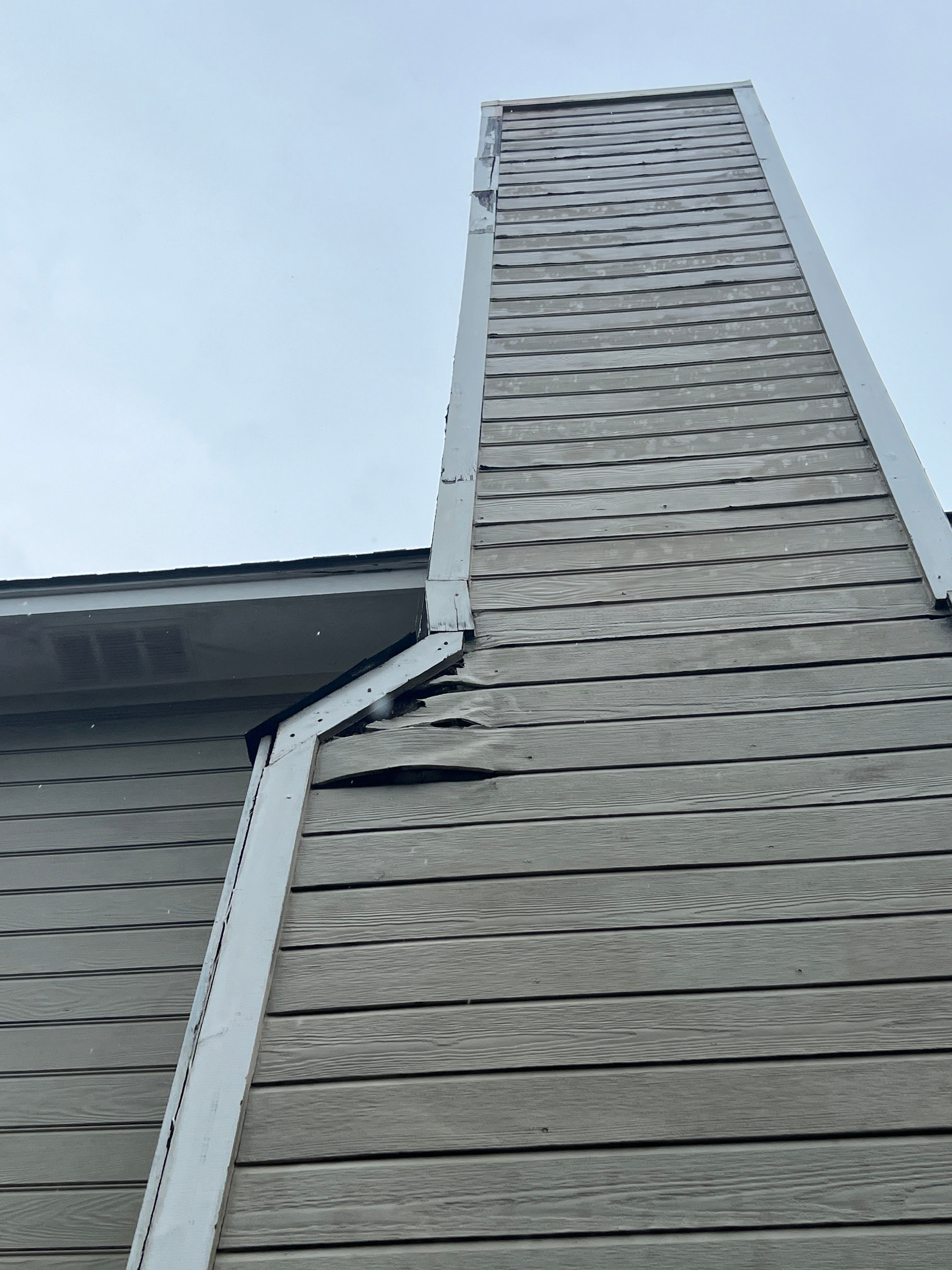 Evening Blue Hardie + Windows by Freedom Exteriors