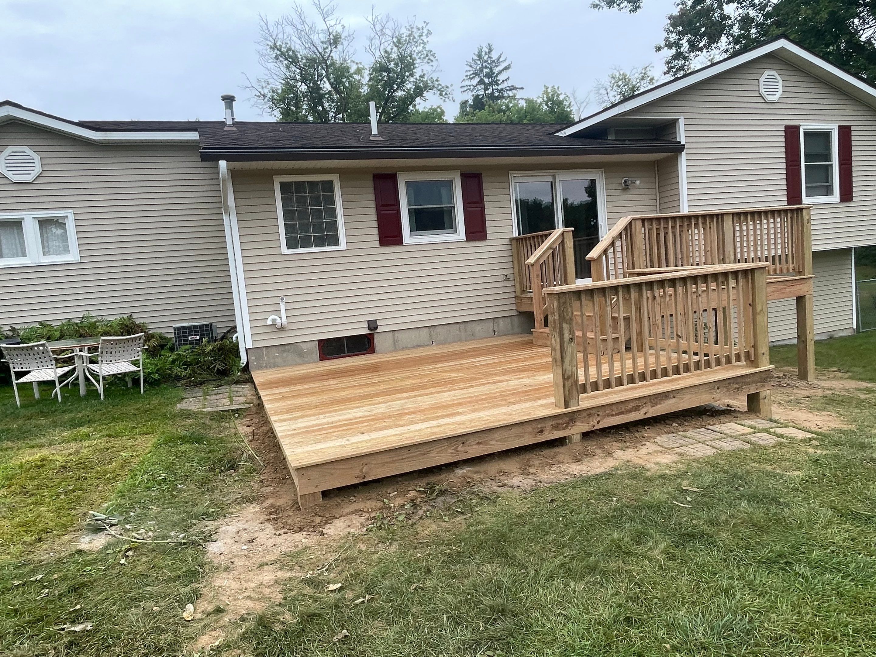 Deck Installation using Treated Lumber by Avalon Roofing and Exteriors