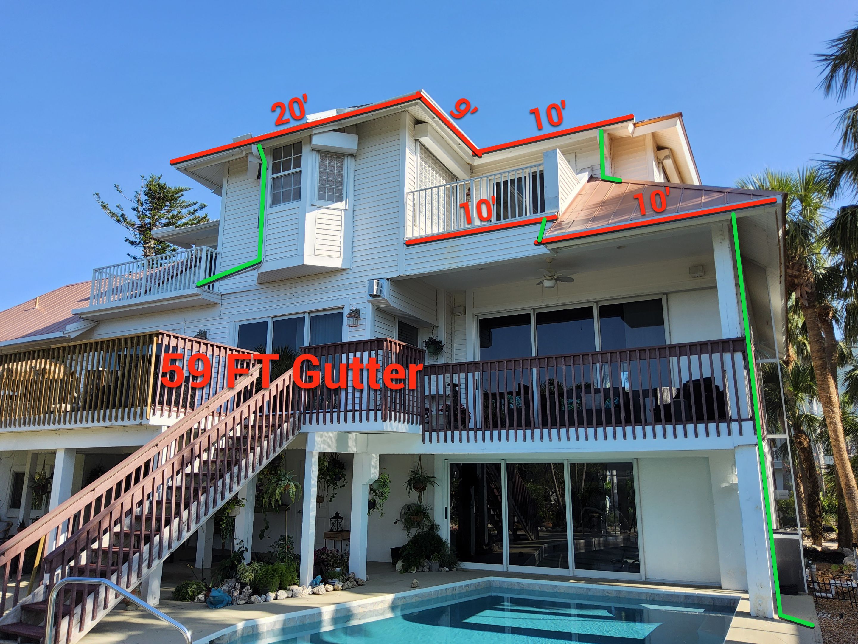 White K-Style Gutters Installed with White Downspouts in Sanibel FL by Gutter Professors