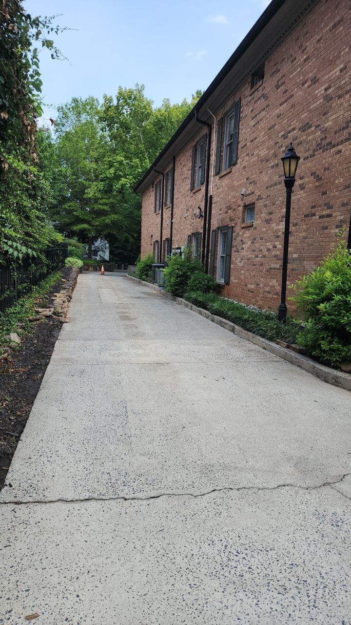 building clean using cleaner by Power Wash Masters LLC
