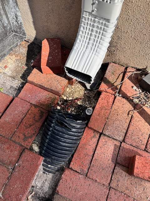 Downspout Installation in Longboat Key FL by Gutter Professors