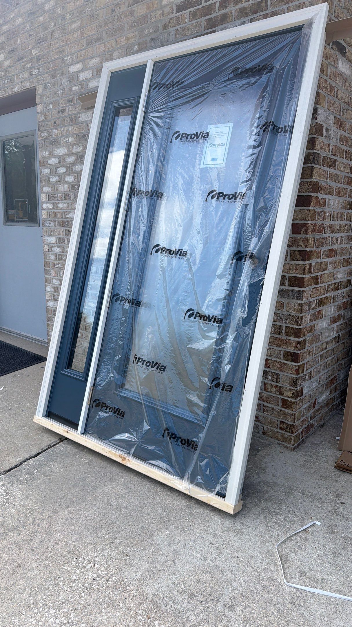 Commercial Entry Door Upgrade with ProVia Sidelight in Newberry by Windows & Doors Store