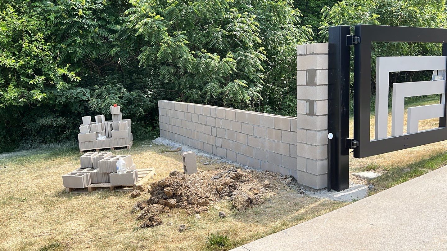 Fence / Retaining Wall using Block then parge by ACE Waterproofing & Basement Solutions