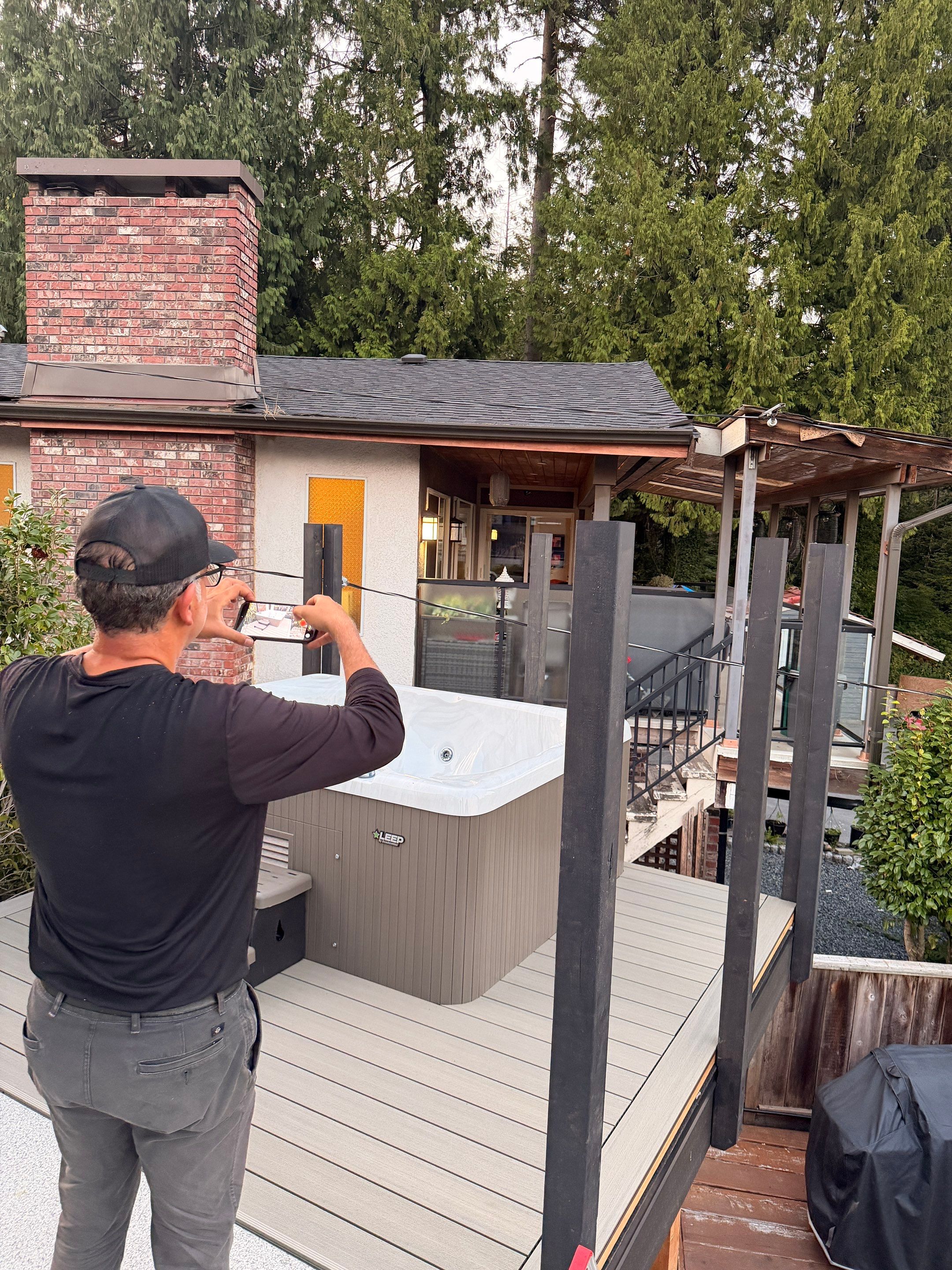 New Composite Deck with glass railing in North Vancouver by YVR Construction Group