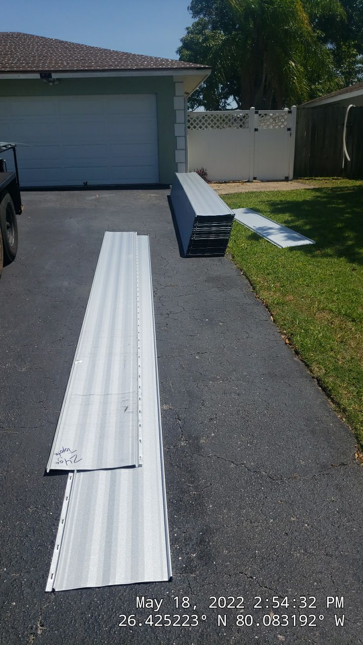 Residential Roofing Installation using 1" Nail strip metal roof by BLUES BROTHERS ROOFING