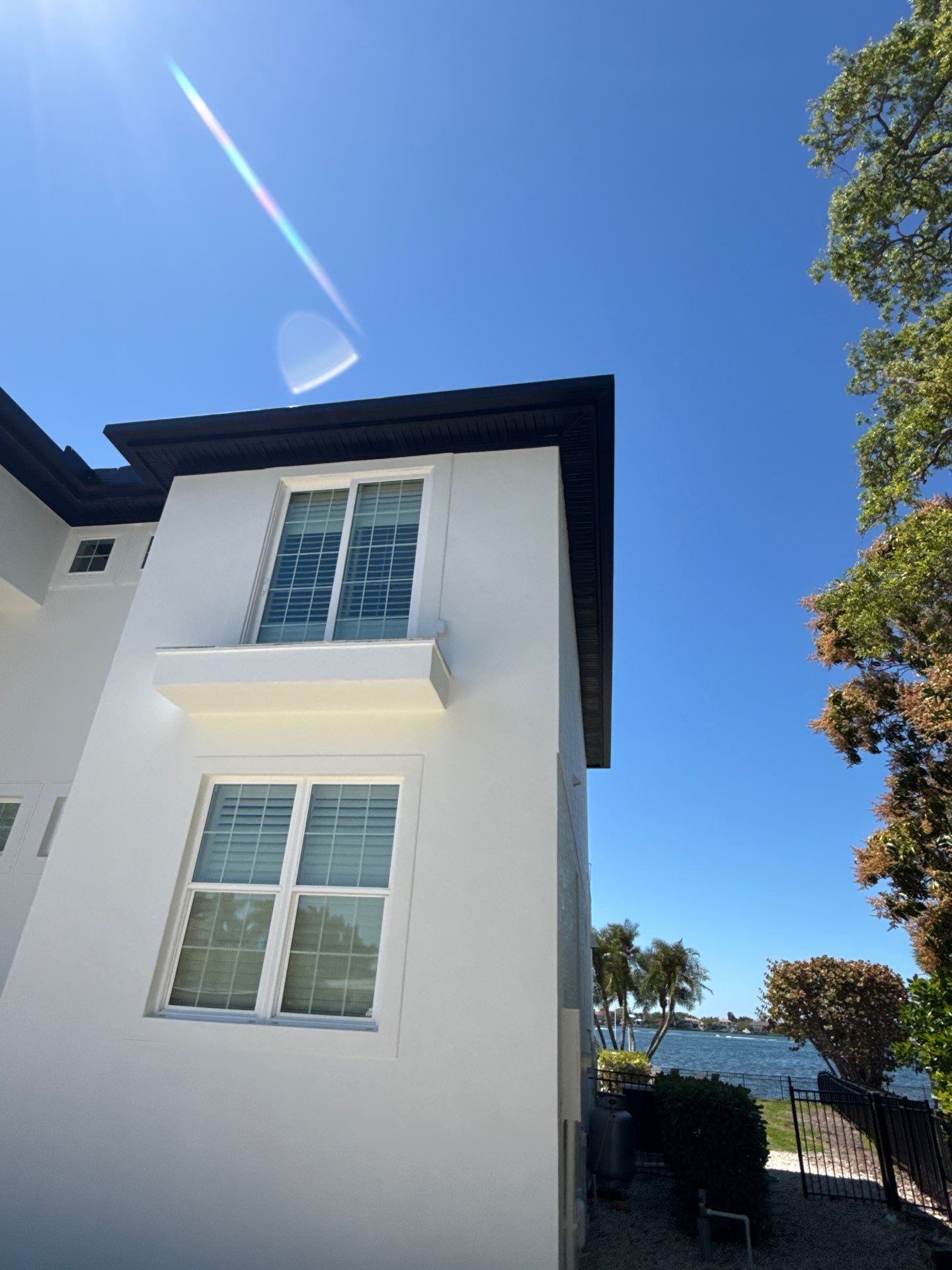 Soffit and Fascia Installation and black seamless gutters in Sarasota FL by Gutter Professors