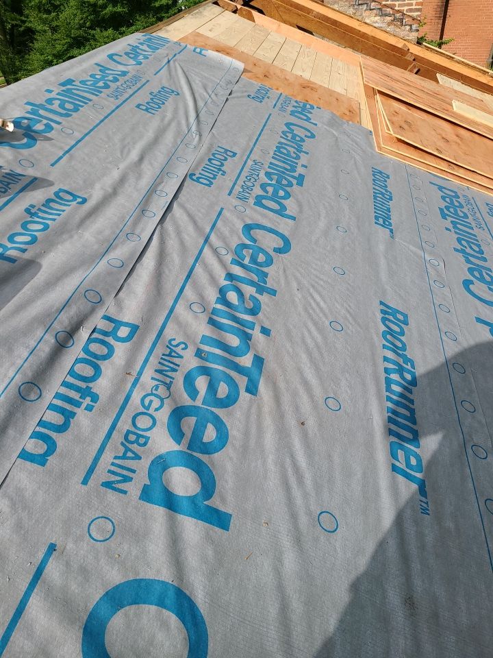 Springfield Tree Damage Restoration: CertainTeed Landmark Designer Shingles in Charcoal Black by RM Banning, Inc.