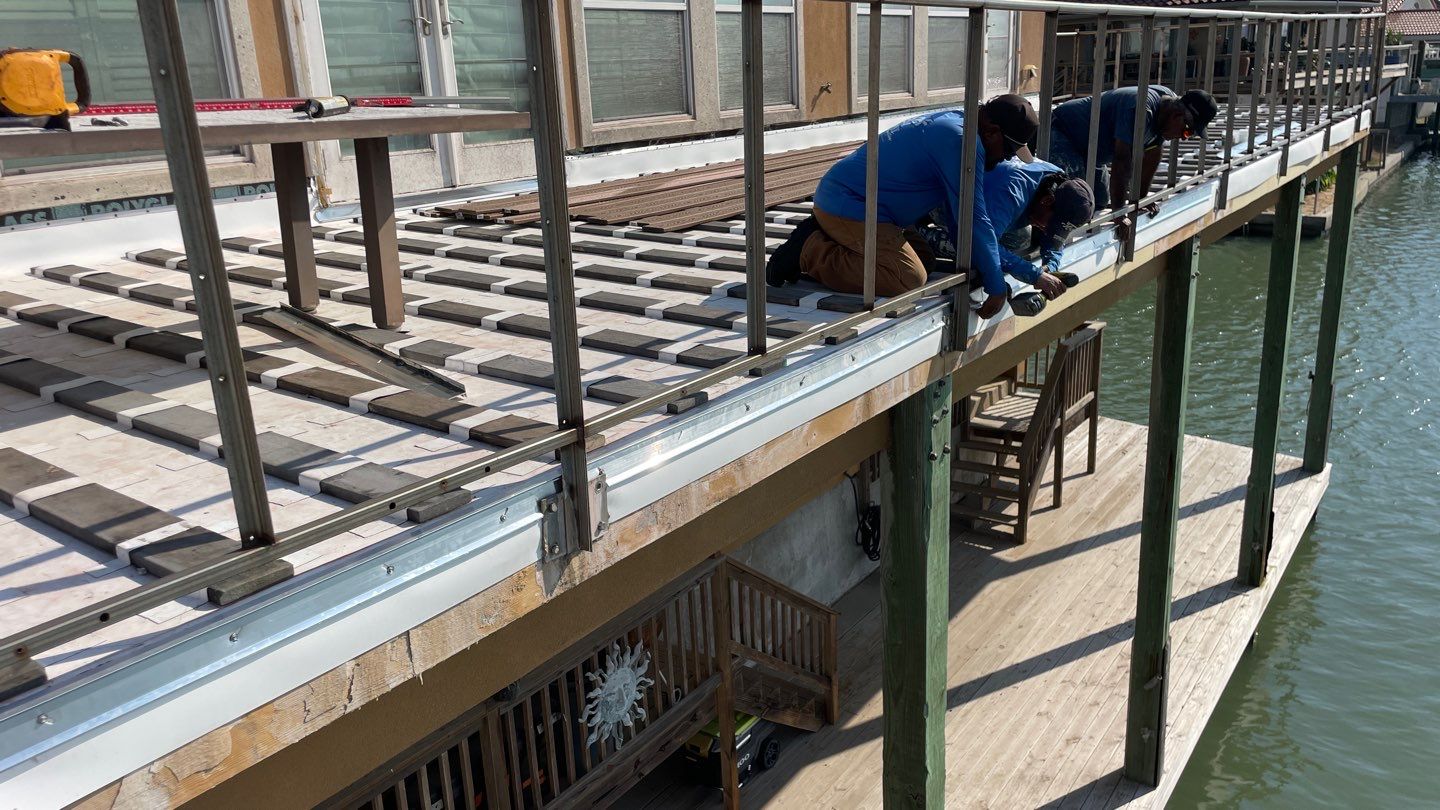 Walk Out Patio Cover by Bayfront Roofing and Construction