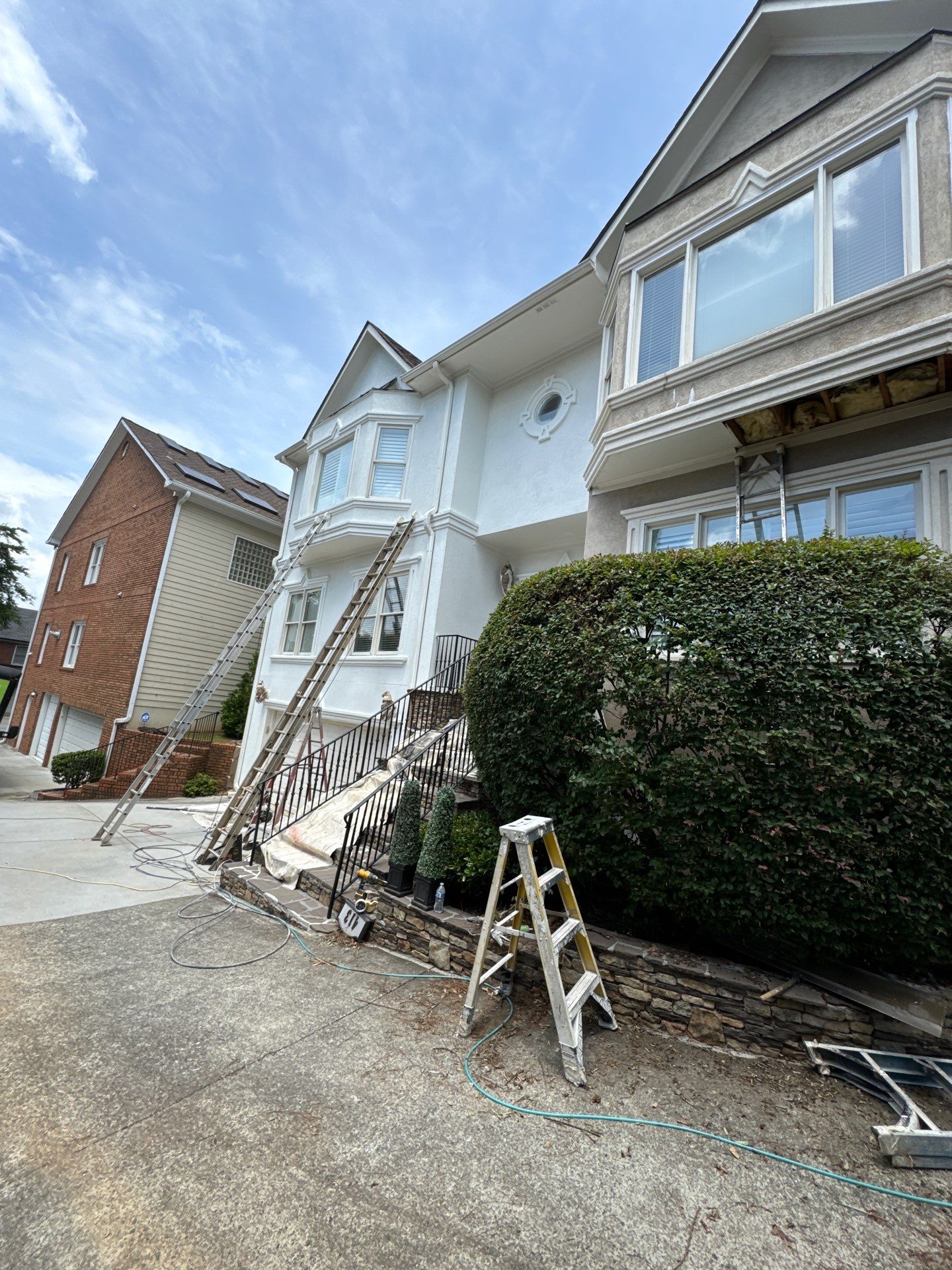 Full Exterior Stucco Painting and Wood Deck Staining in Atlanta by Swift Home Renovations