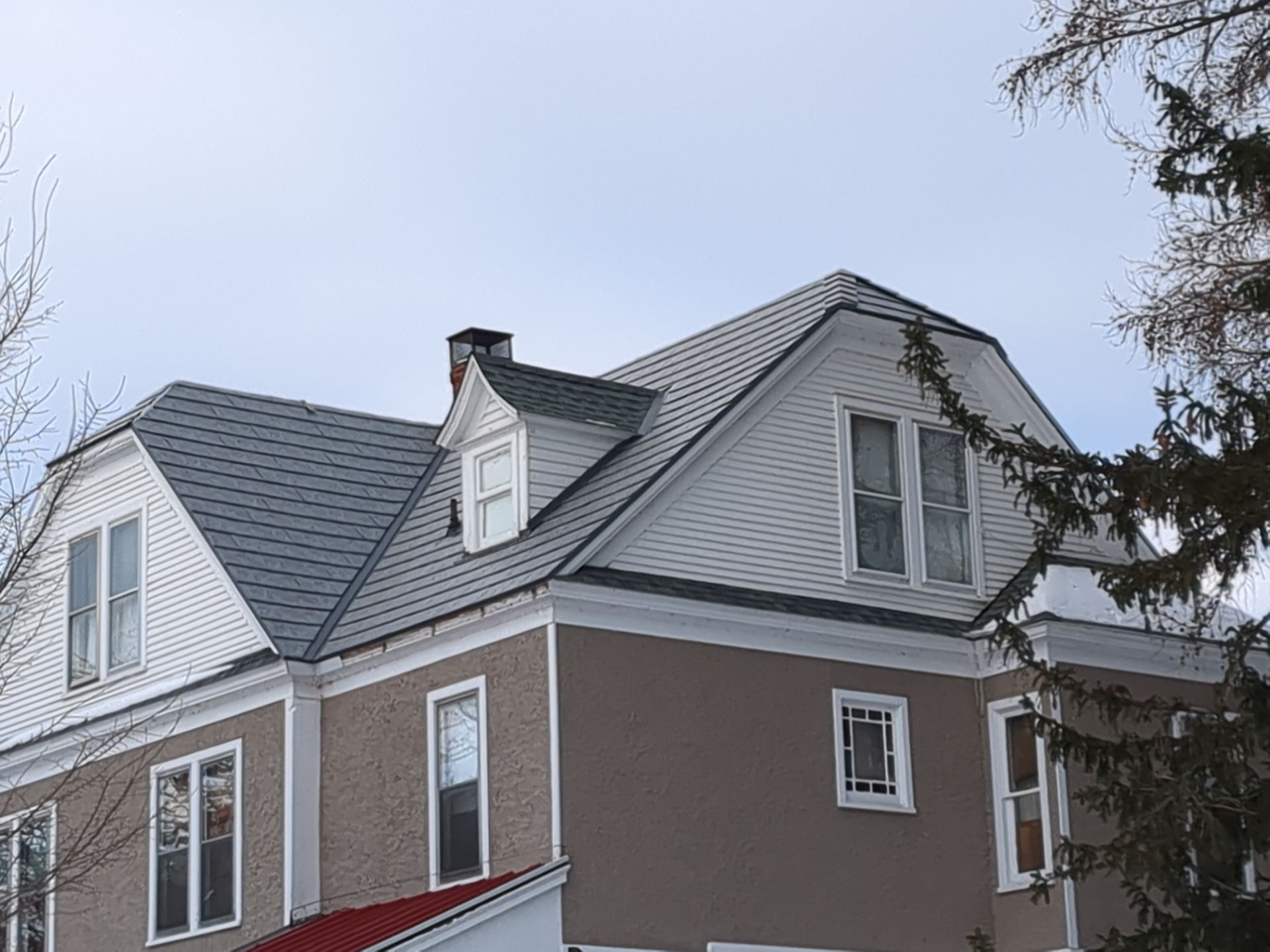 Provia Metal Roofing Installation on Historic Victorian Home by Esh Builders
