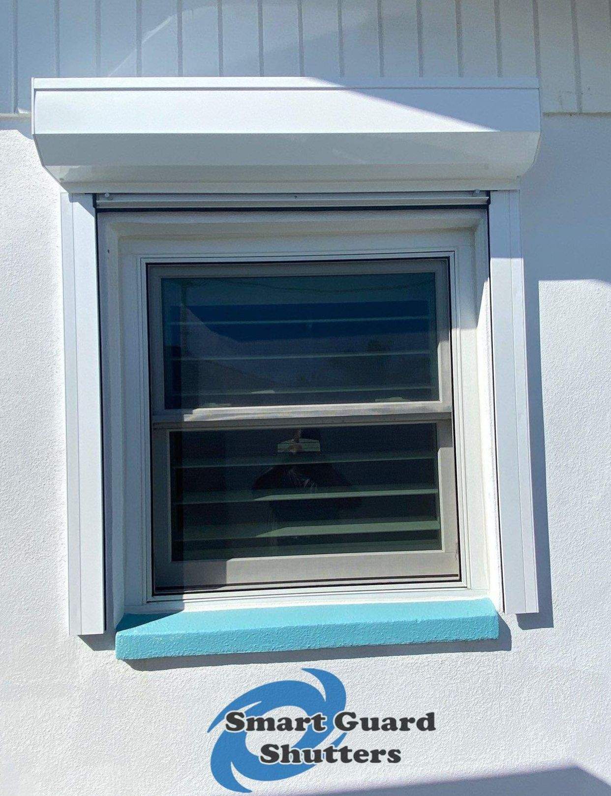 Rolling Shutters in White by Smart Guard Shutters