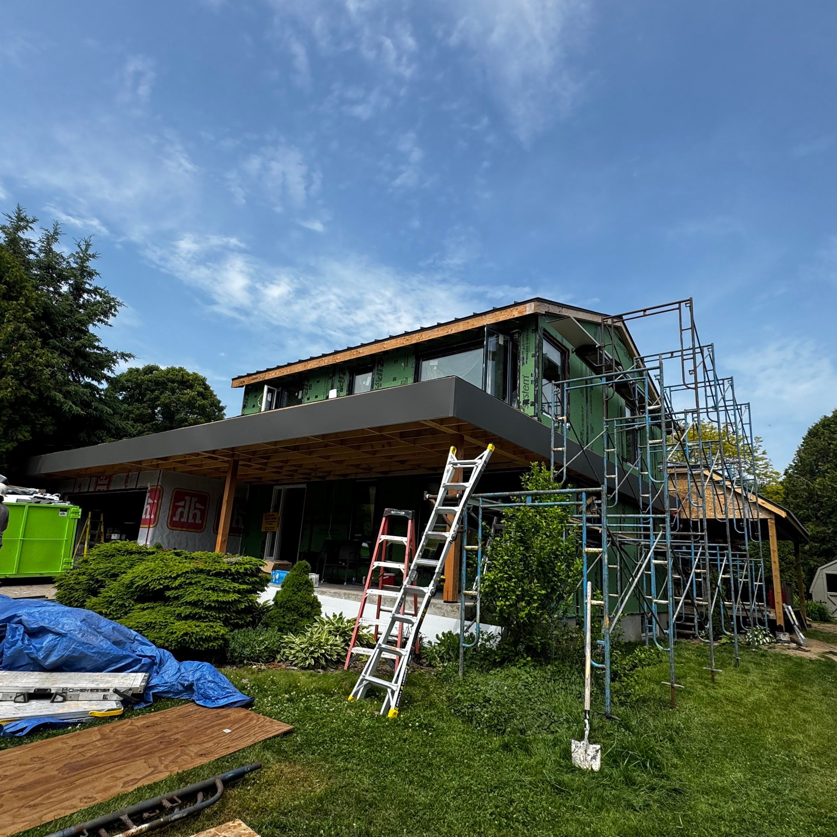 Residential Roofing Installation using 16" Standing Seam Panels by Jay Carter Roofing & Sheet Metal