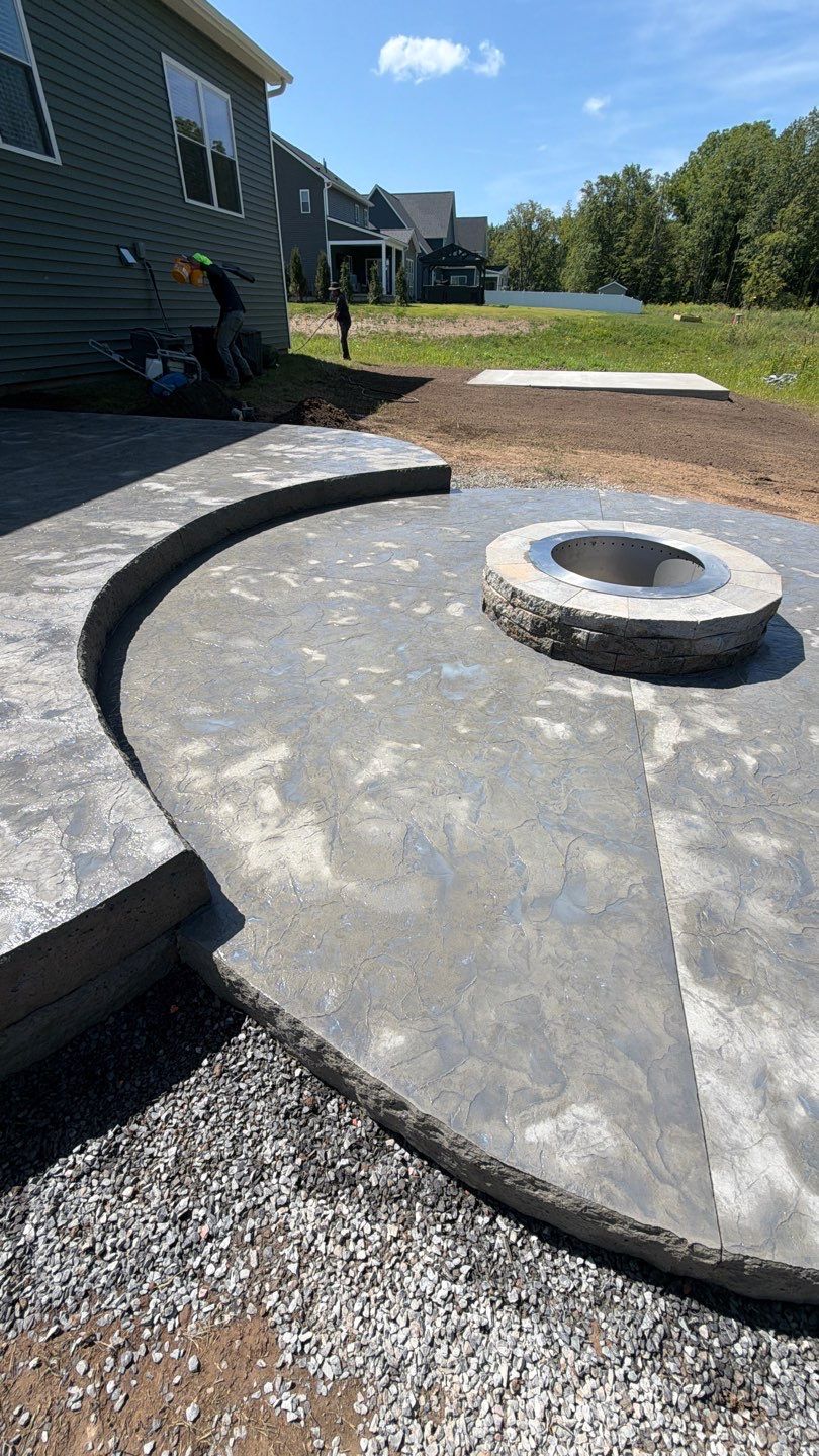 Oxford Slate Patio with Fire Pit by NG Masonry & Construction LLC