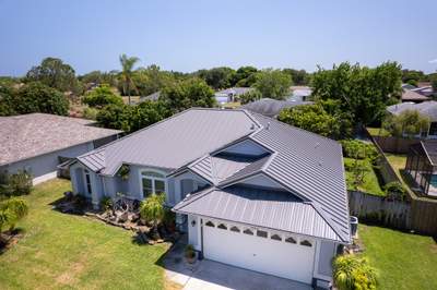 Complete Metal Roof Replacement and Seamless Gutter Installation in Melbourne