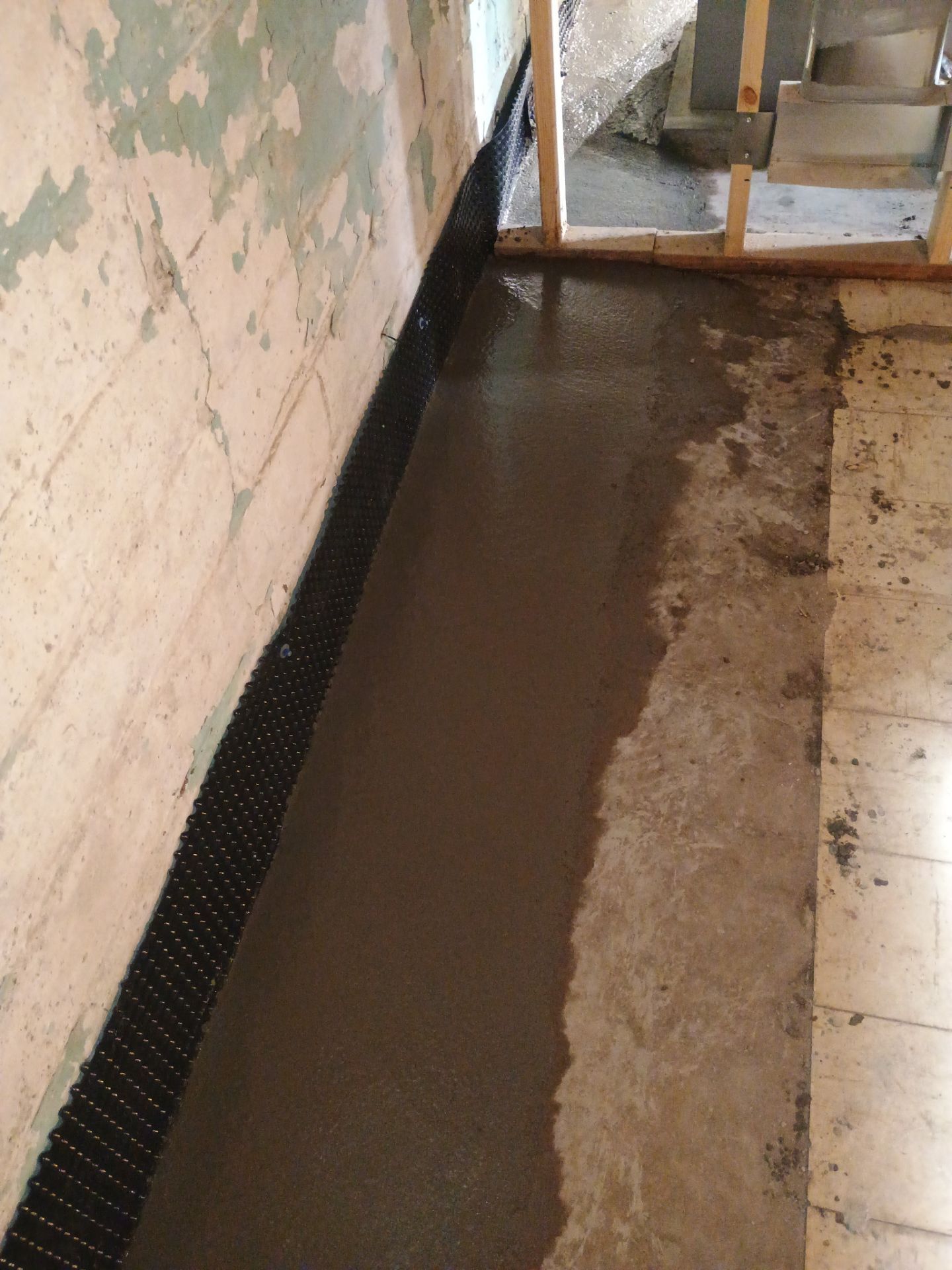 Interior Drain Tile for a South Minneapolis Basement by Waterproofing Northeast