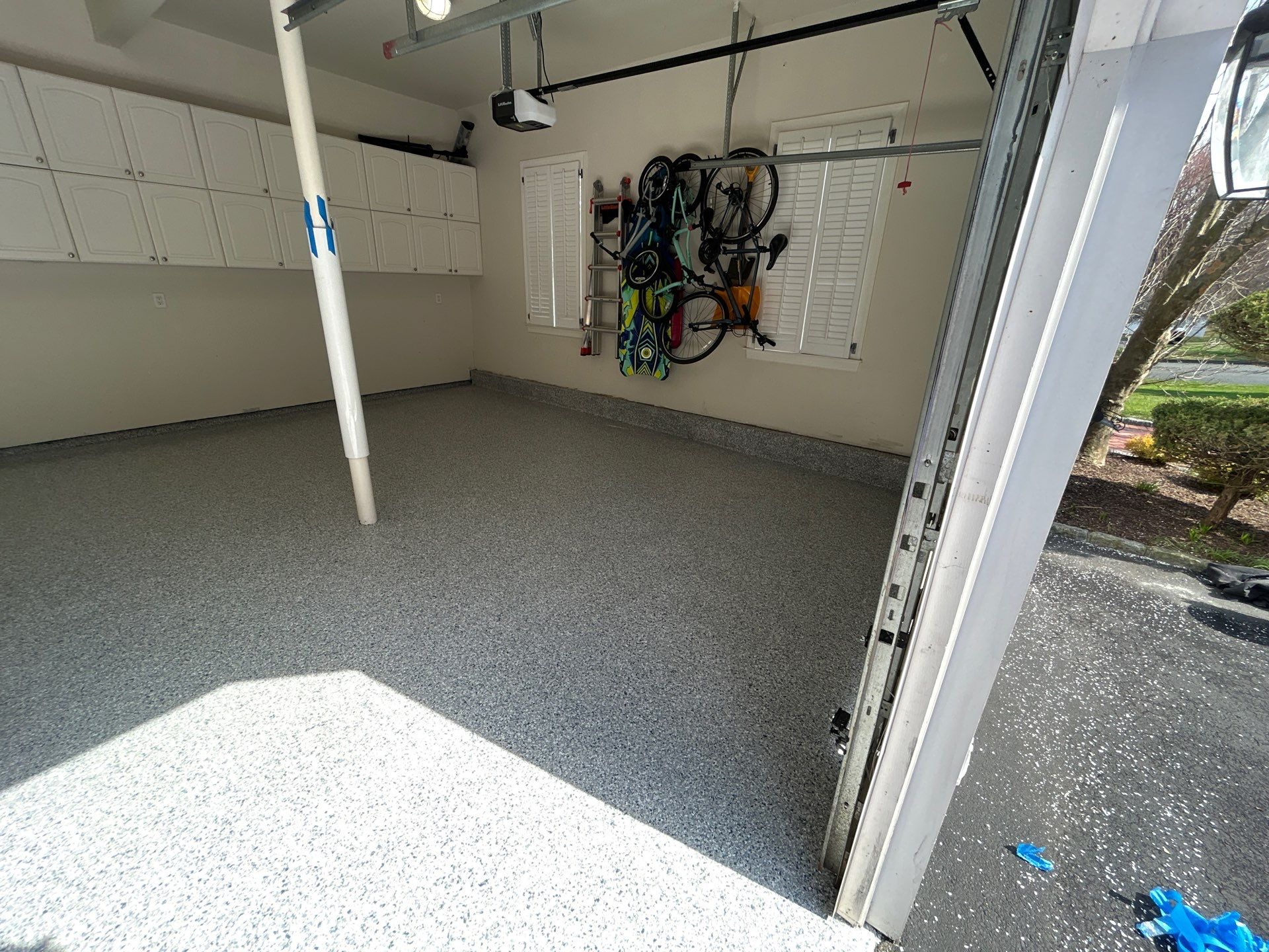 Concrete Floor Coating Transformation by DiGiorgi Roofing and Siding Inc