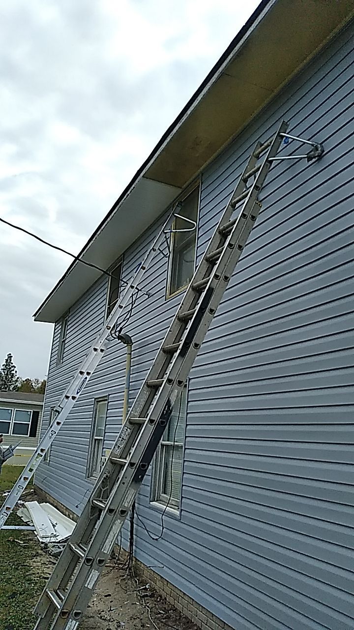 Interior and exterior renovation using Royal Building Products  by Indigo State Roofing